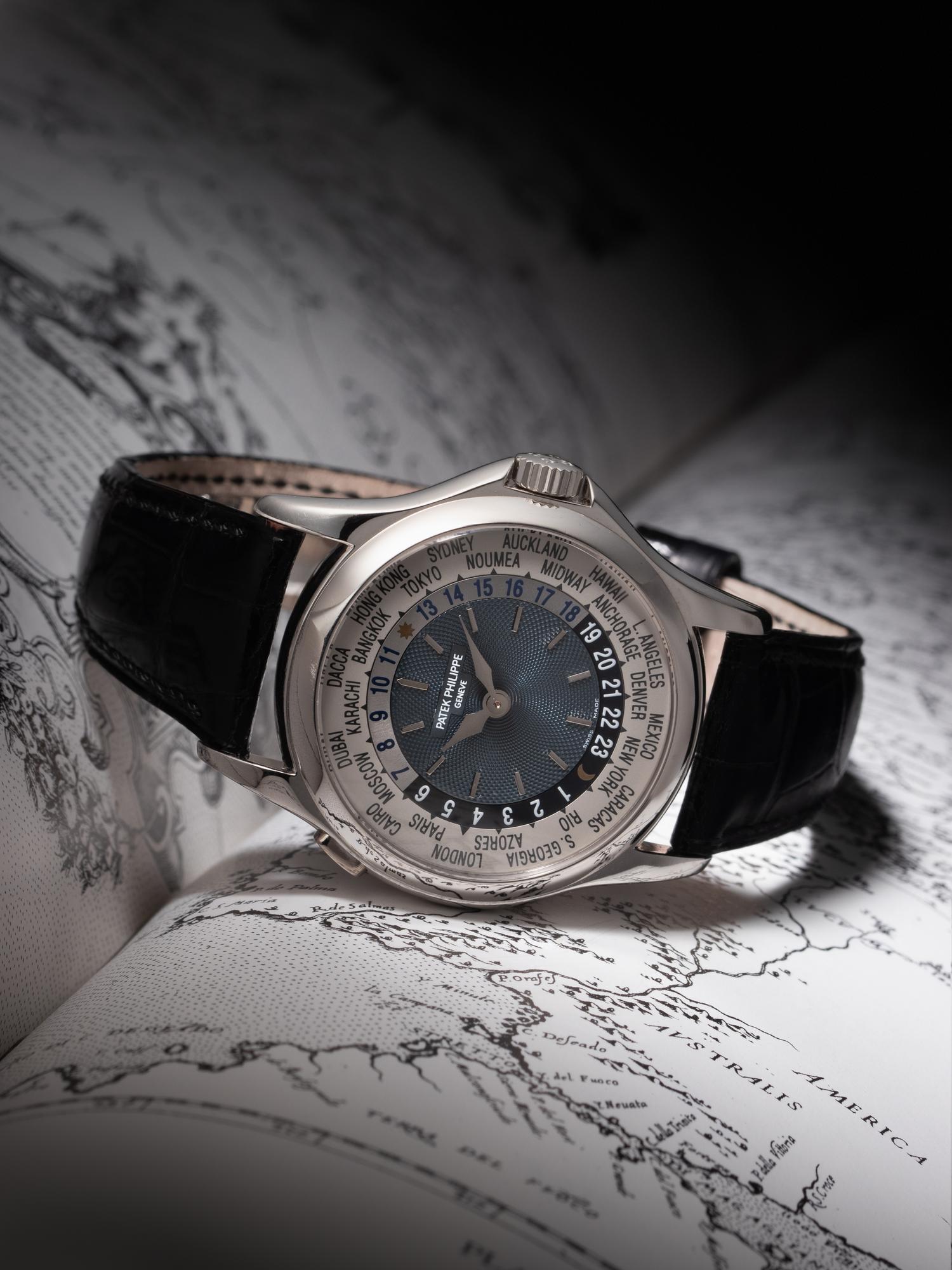 A FINE AND ATTRACTIVE PATEK PHILIPPE, REF. 5110P PLATINUM 'WORLD TIME' WRISTWATCH