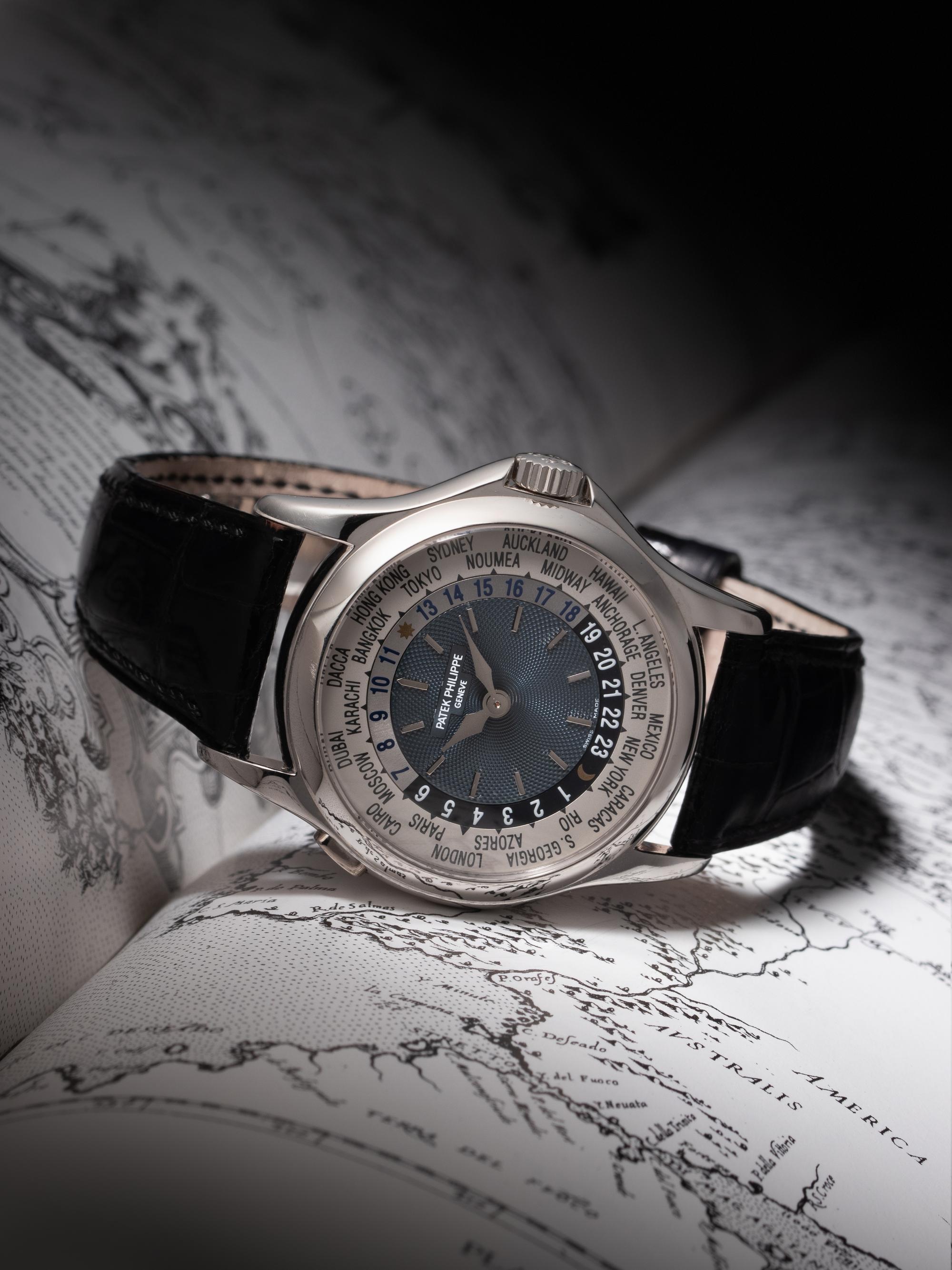A FINE AND ATTRACTIVE PATEK PHILIPPE, REF. 5110P PLATINUM 'WORLD TIME' WRISTWATCH