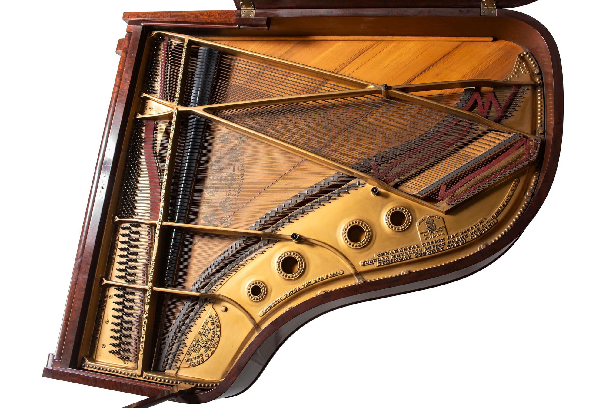 A Steinway and Sons Mahogany Baby Grand Piano