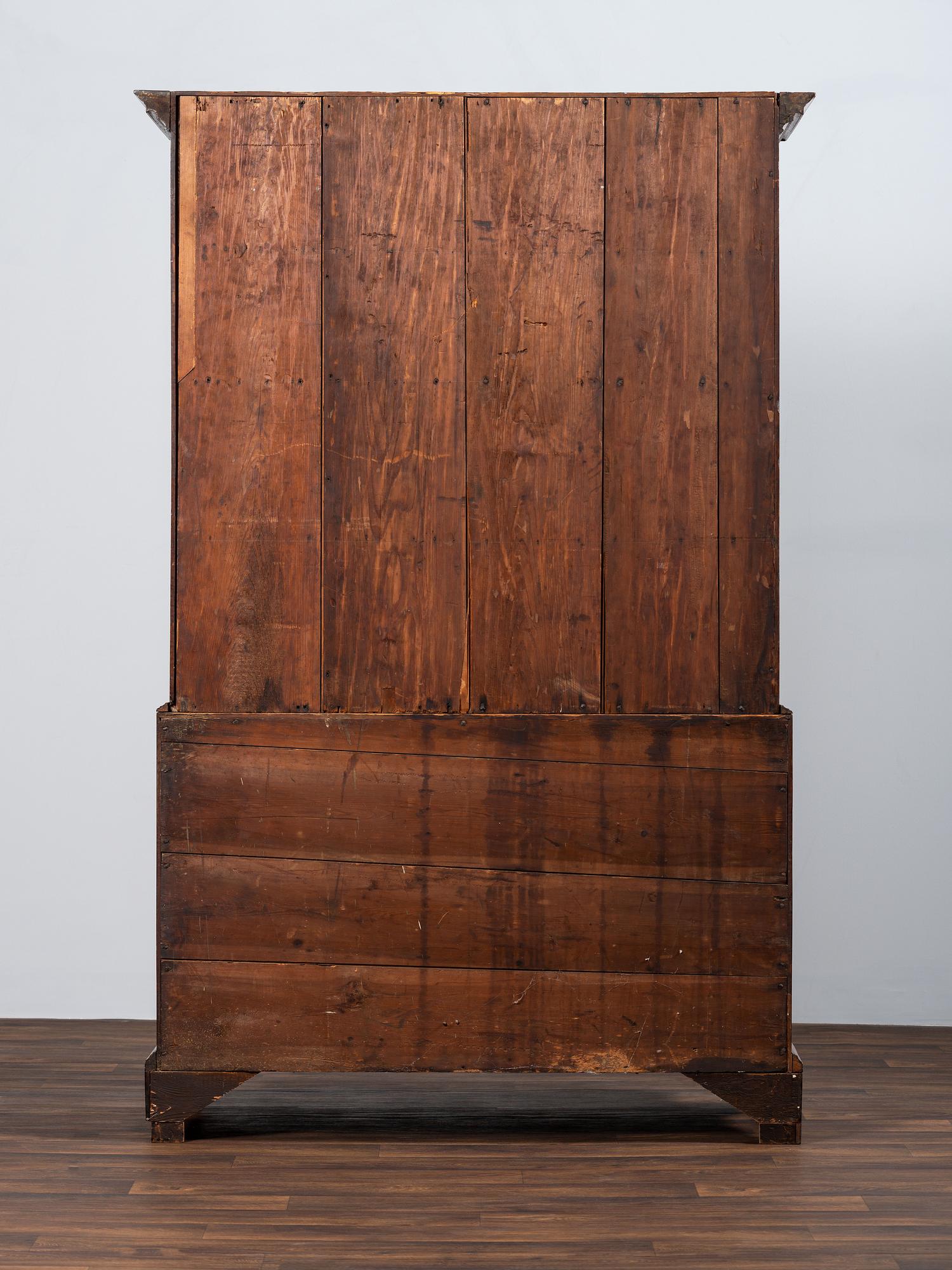 A Chippendale Figured Mahogany Linen Press
