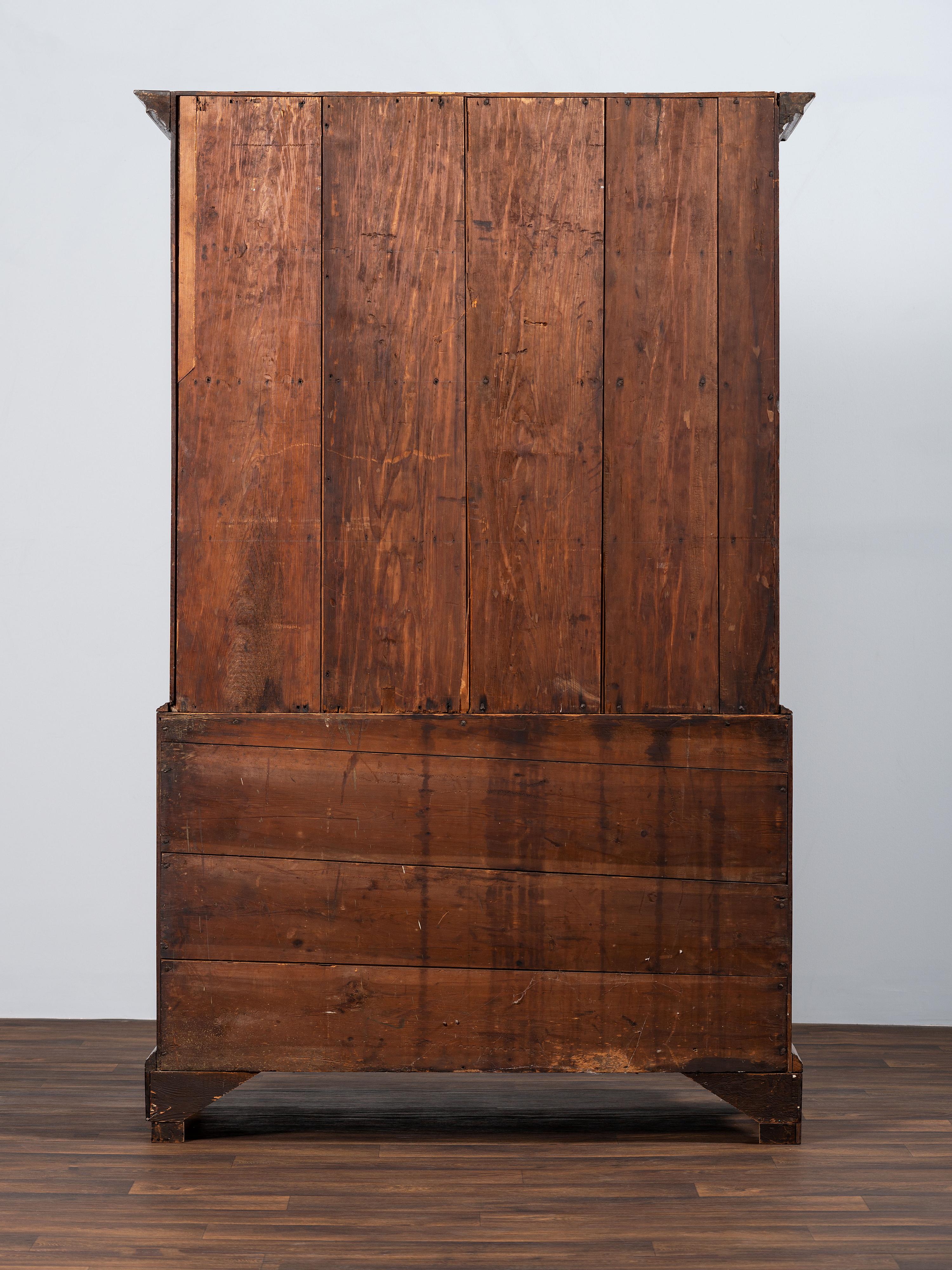 A Chippendale Figured Mahogany Linen Press