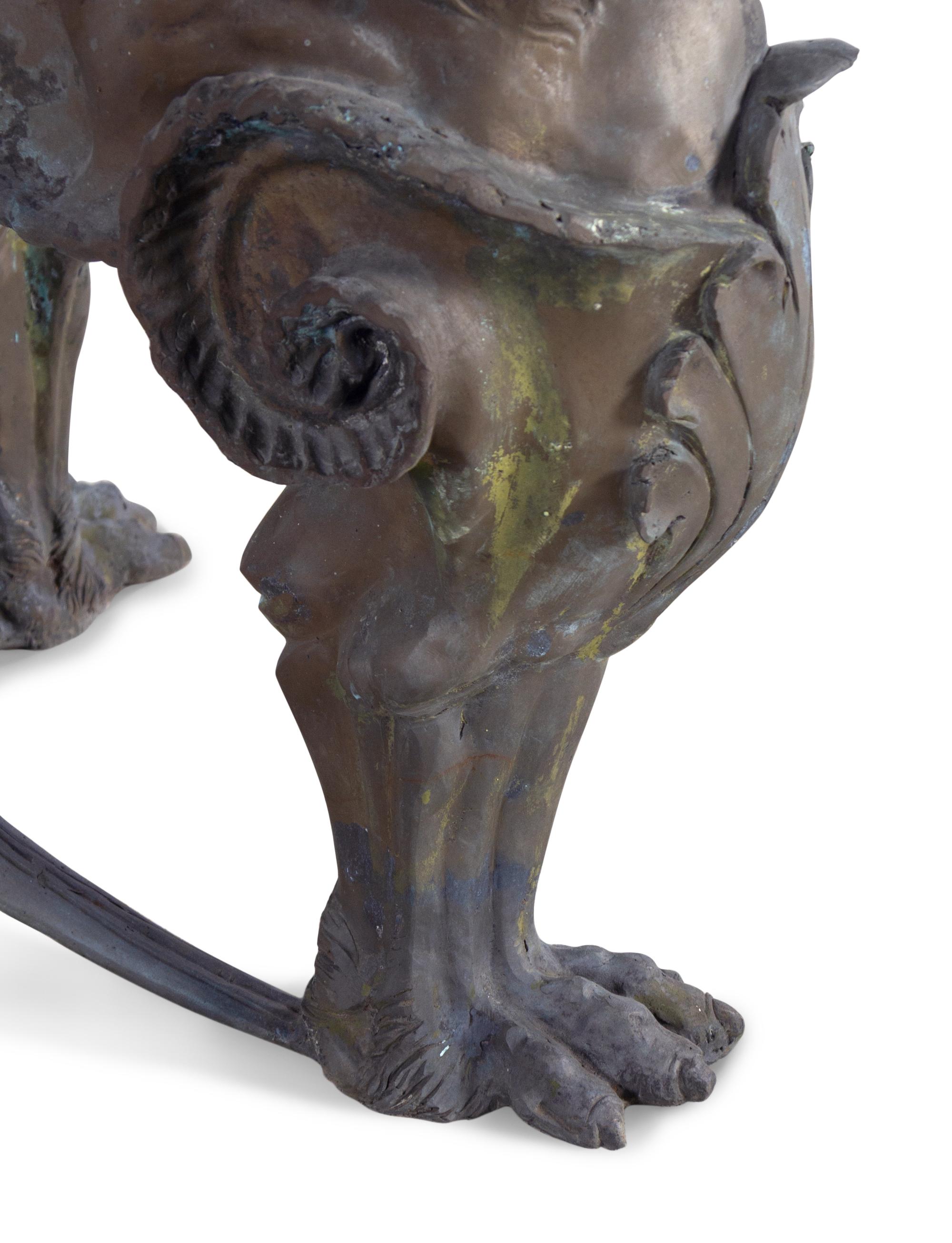 A Neoclassical Style Cast Metal Table Base with Lion Supports