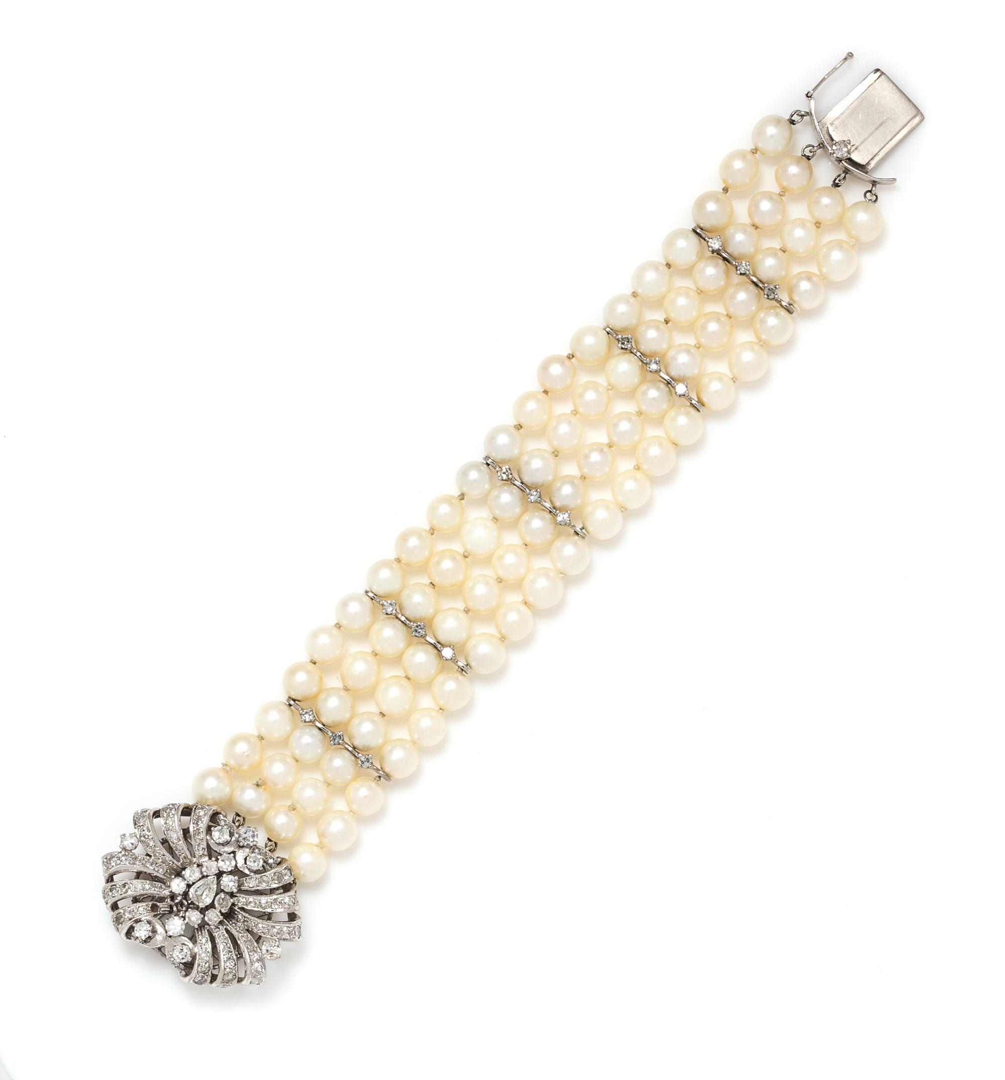A White Gold, Diamond and Cultured Pearl Multistrand Bracelet, 33.10 dwts.
