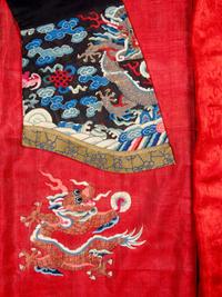 A Chinese Red Ground Kesi Silk Dragon Robe, Jifu, 19th Century 清晚期 紅地緙絲龍紋吉服