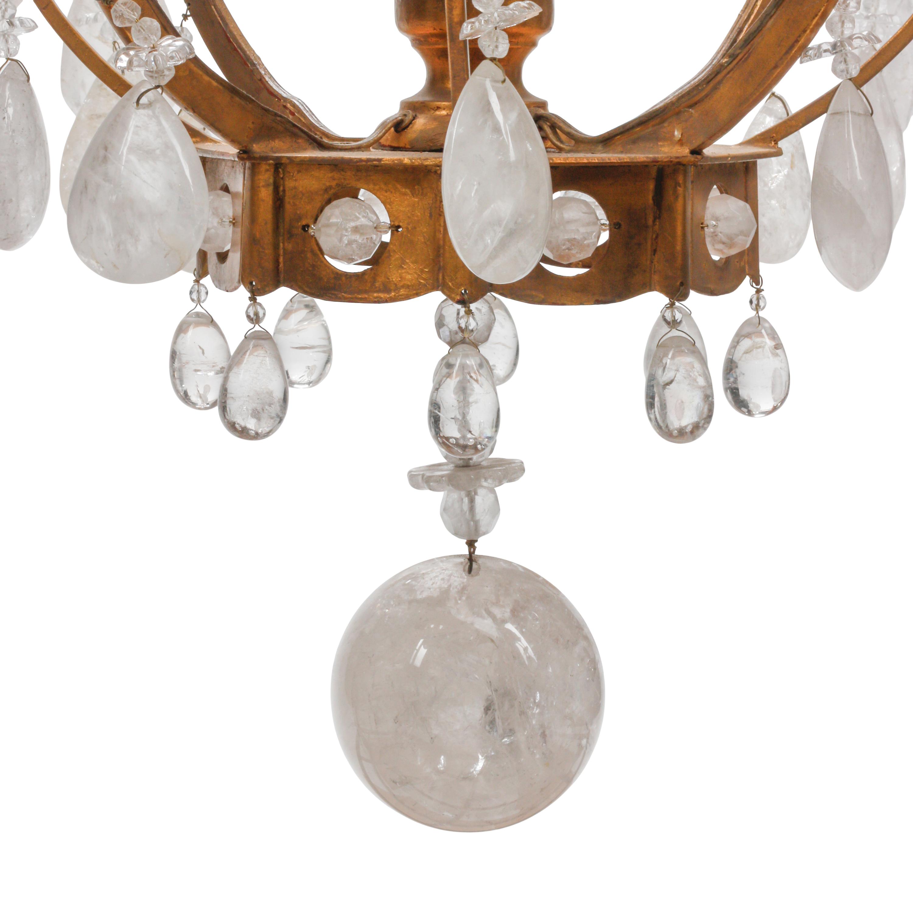 A Louis XV Style Gilt Metal and Rock Crystal Thirteen-Light Chandelier