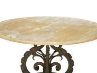 A Bronze and Stone Table with an Inlaid Stone Top