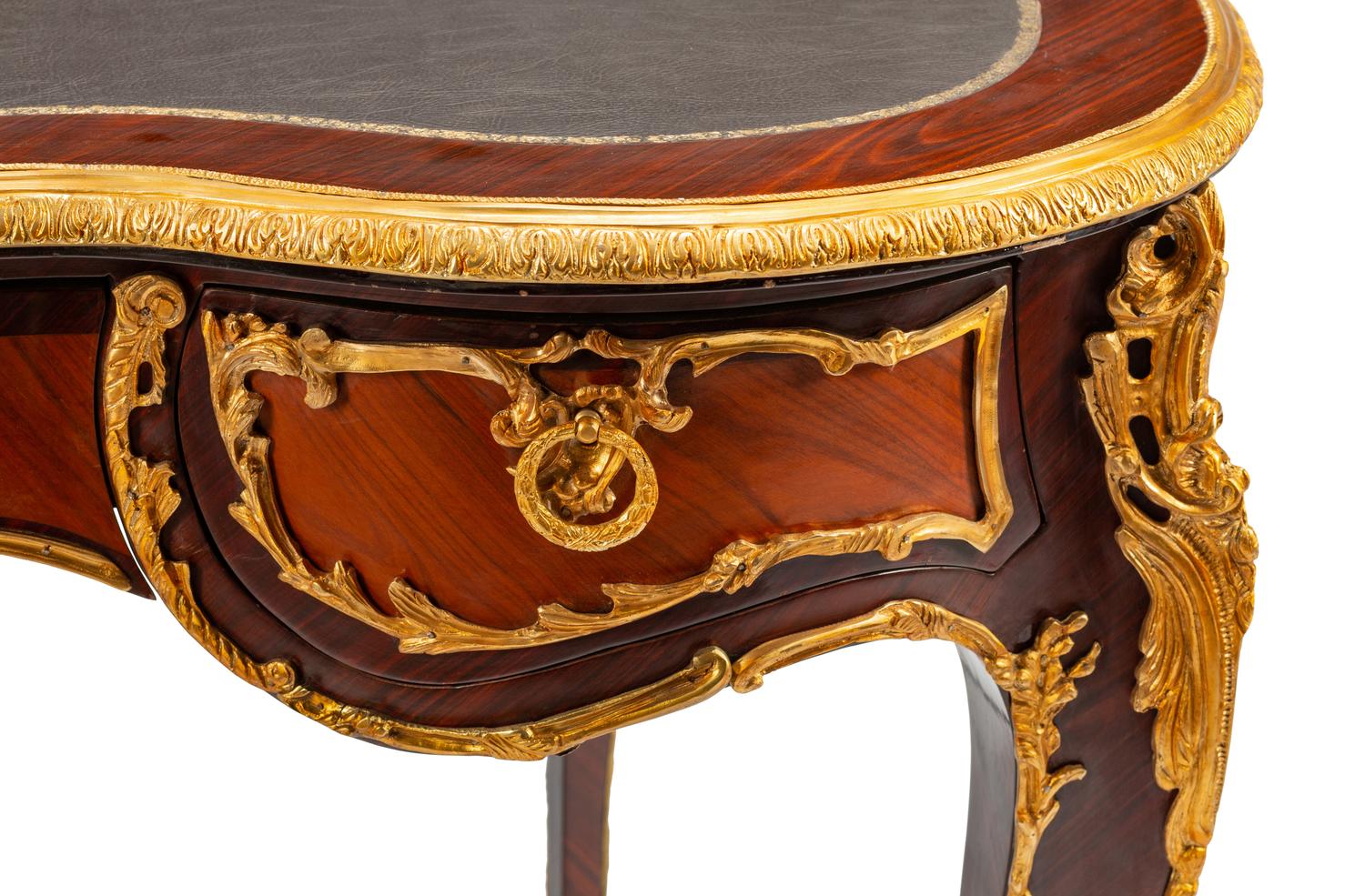 A Louis XV Style Gilt Bronze Mounted Reniform Bureau Plat