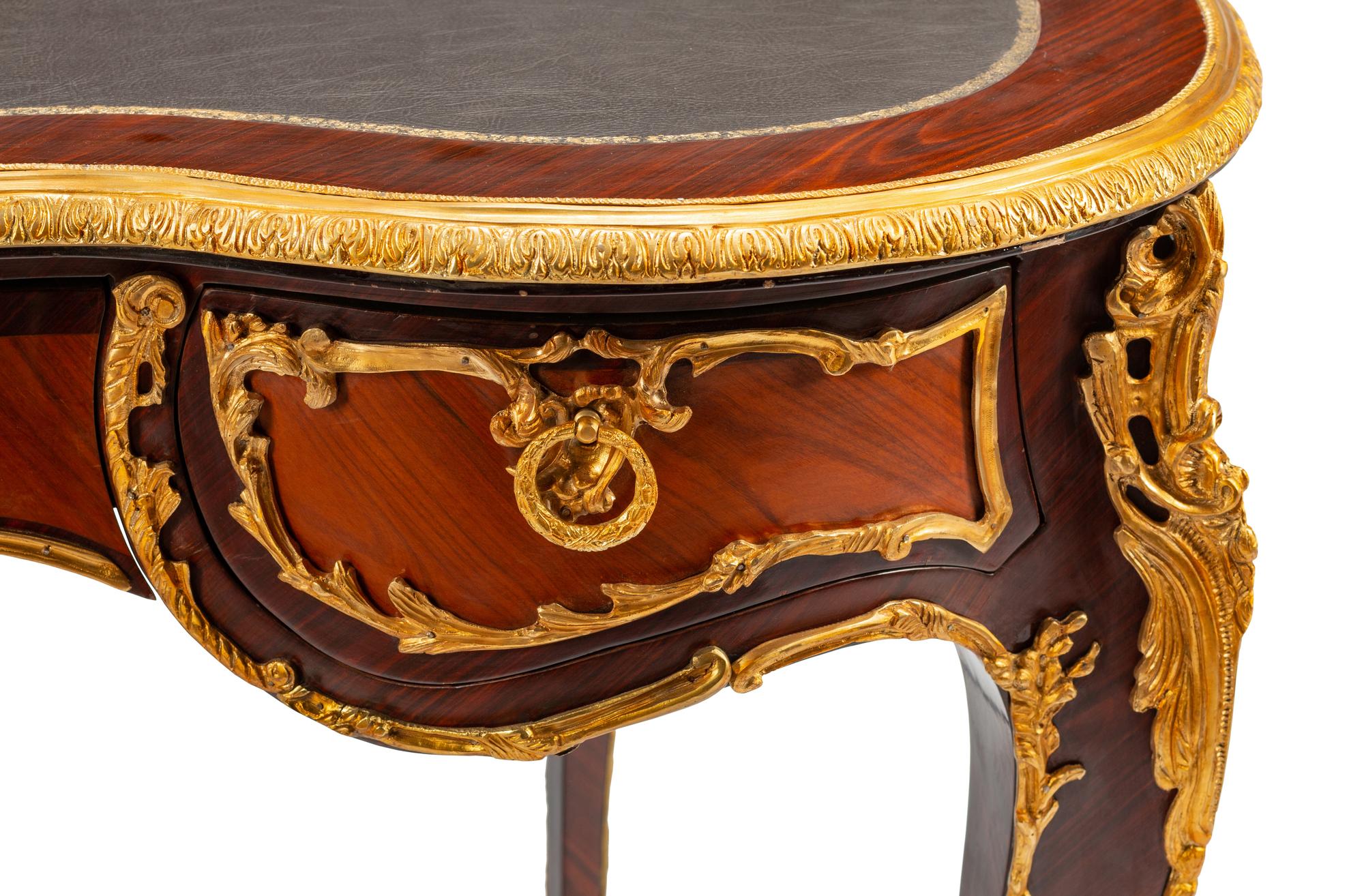 A Louis XV Style Gilt Bronze Mounted Reniform Bureau Plat