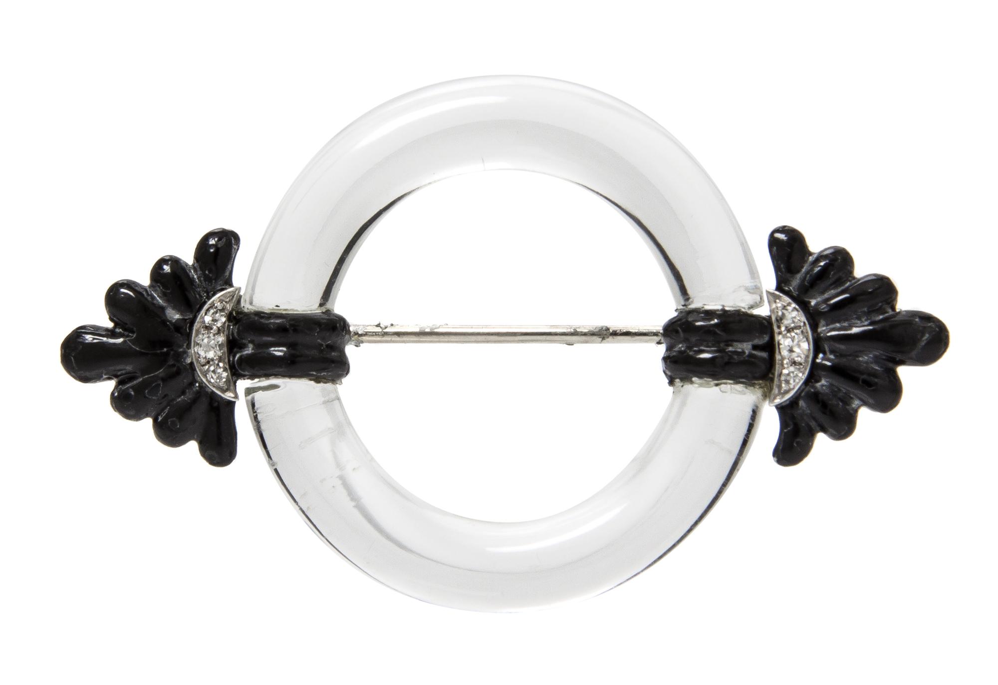 An Art Deco Platinum, Gold, Rock Crystal, Enamel and Diamond Circle Brooch, 8.50 dwts.