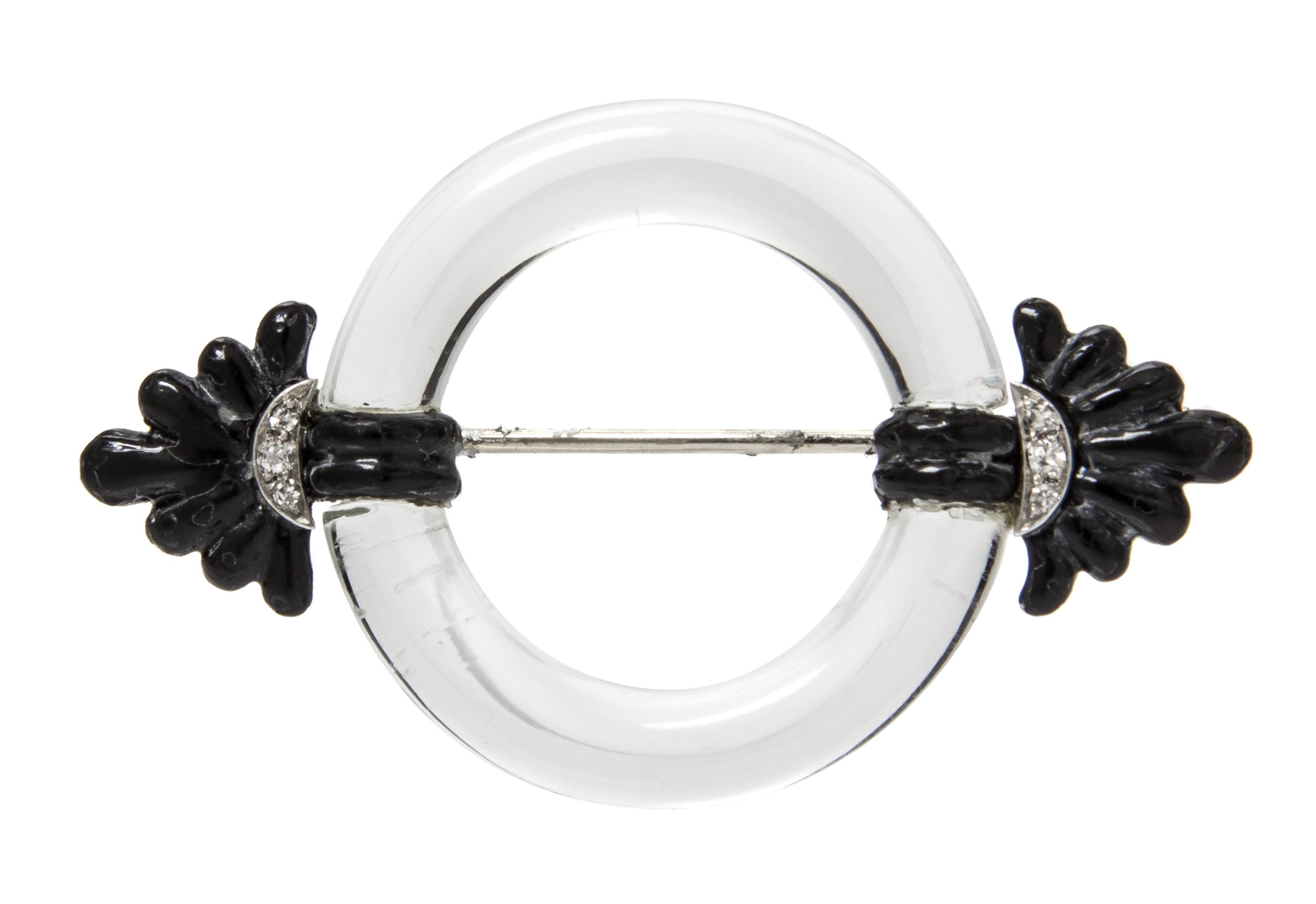 An Art Deco Platinum, Gold, Rock Crystal, Enamel and Diamond Circle Brooch, 8.50 dwts.