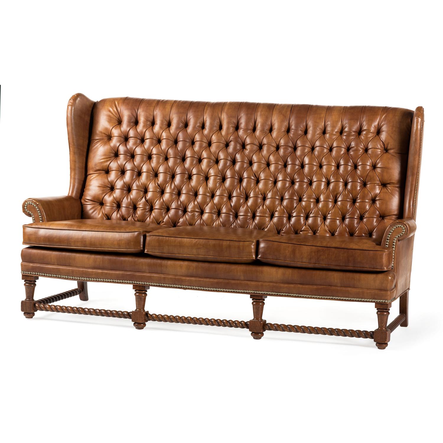 A Set of Leather Upholstered Button Tufted Wingback Sofas and Armchair