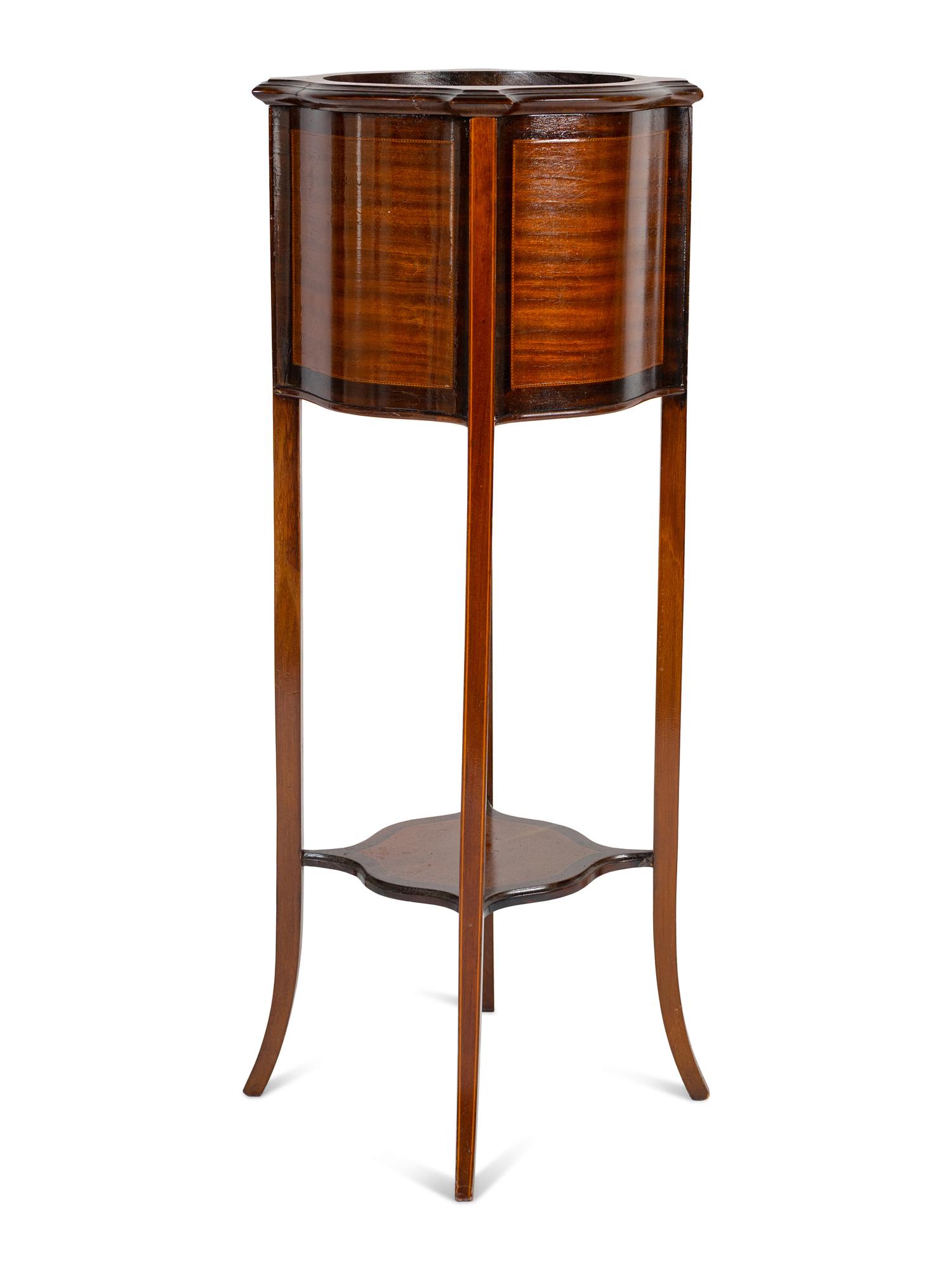 A Federal Style Mahogany Plant Stand Height 38 1/2 x width 13 x depth 13 inches.
