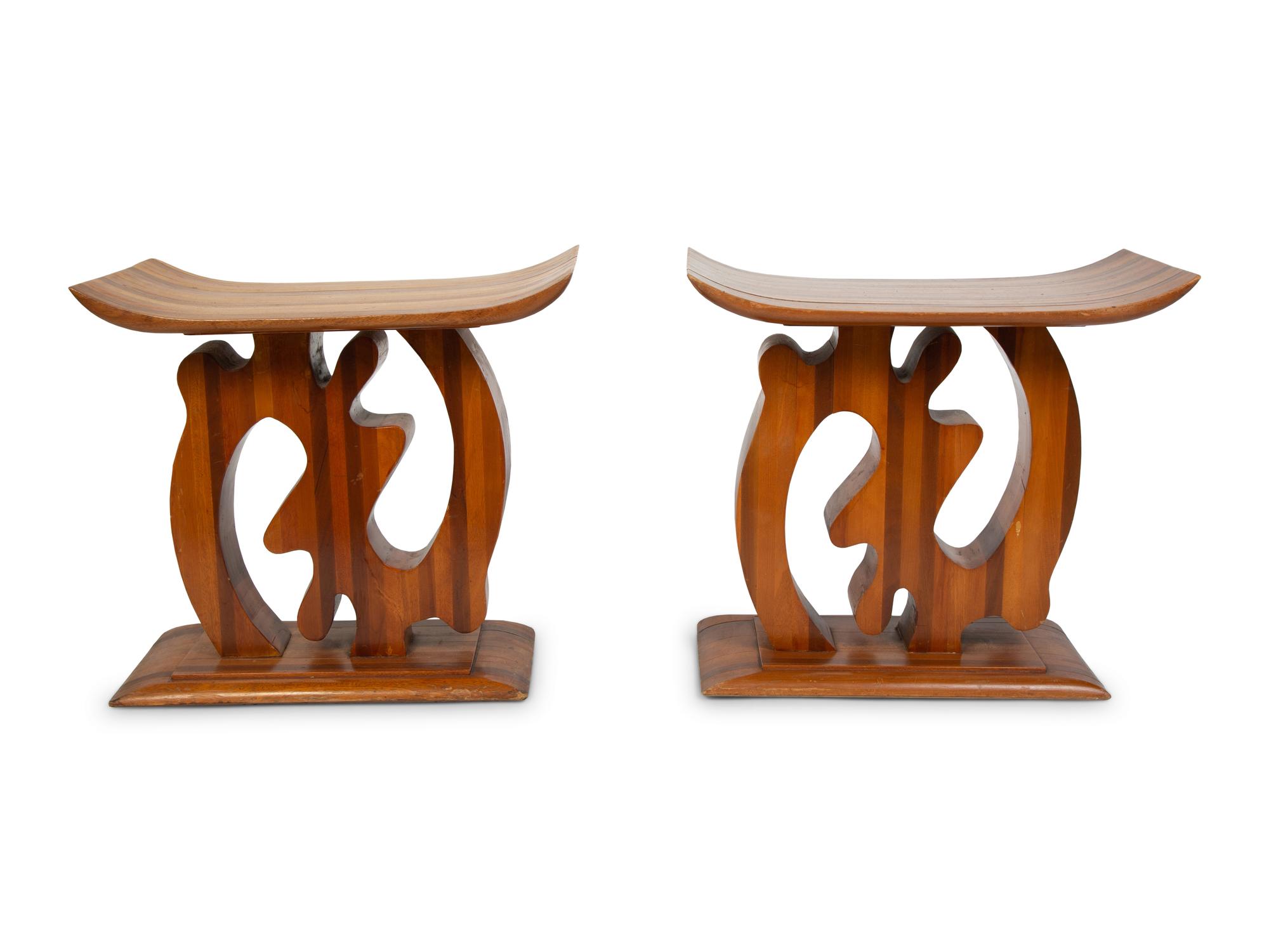 A Pair of Ashanti Style Laminated Wood Stools — 20TH CENTURY