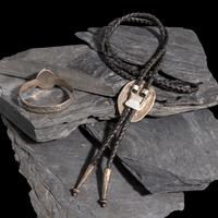 Harvey Chavarria (Santa Clara, 1943-1991) — Silver and Turquoise Bracelet and Bolo Tie