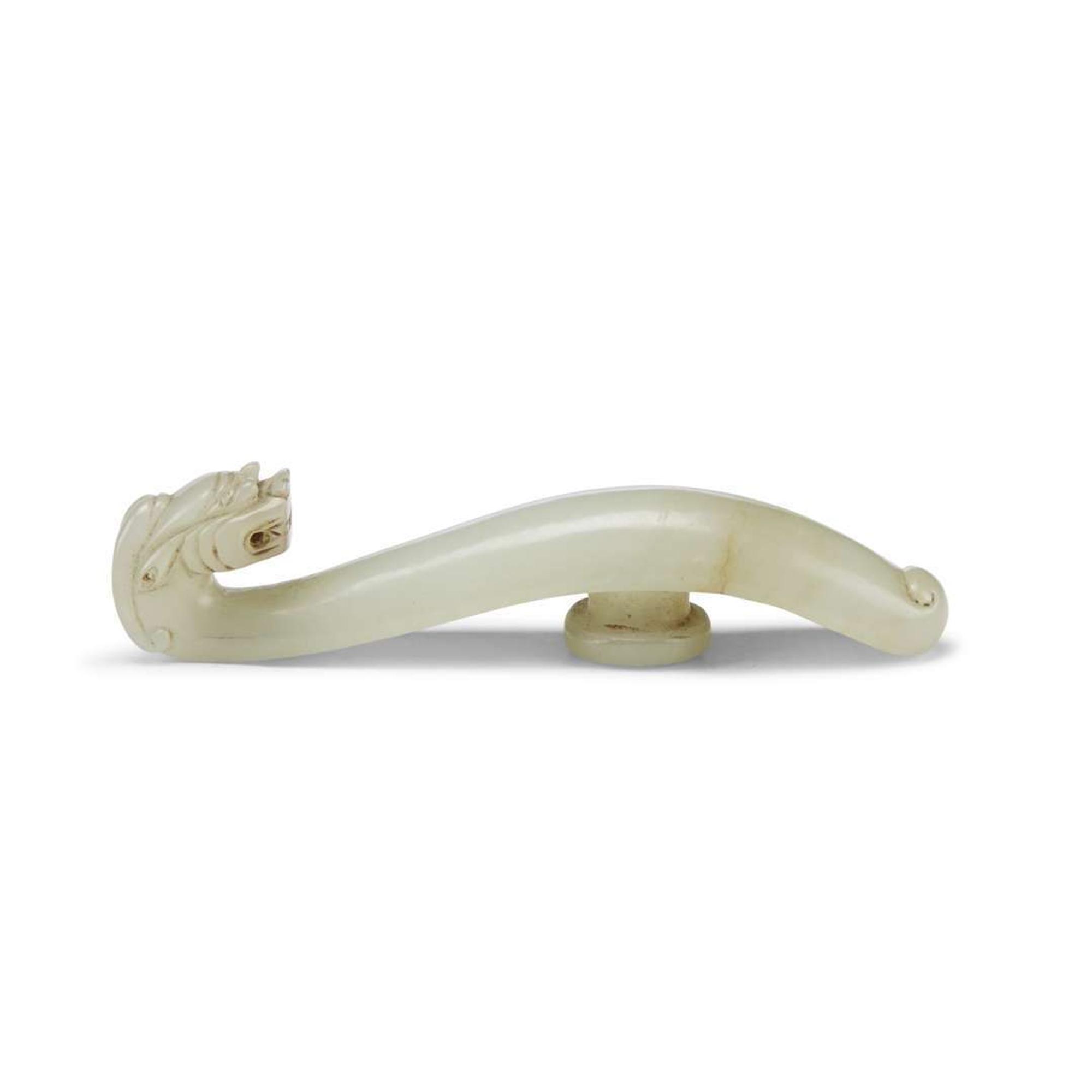 Four Pale Celadon Jade "Dragon" Belthooks, Qing Dynasty 清 青玉龍鉤四件