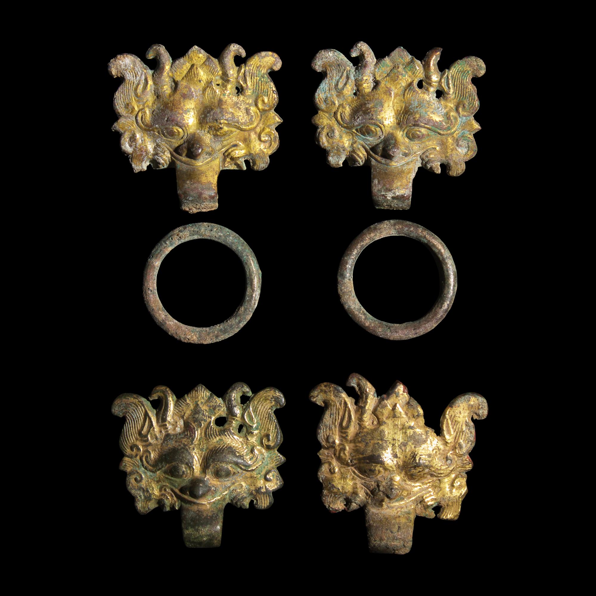 Two Pairs of Chinese Gilt Bronze 'Taotie Mask' Fittings, Han-Six Dynasties — 漢-六朝 銅鎏金饕餮紋輔首兩對
