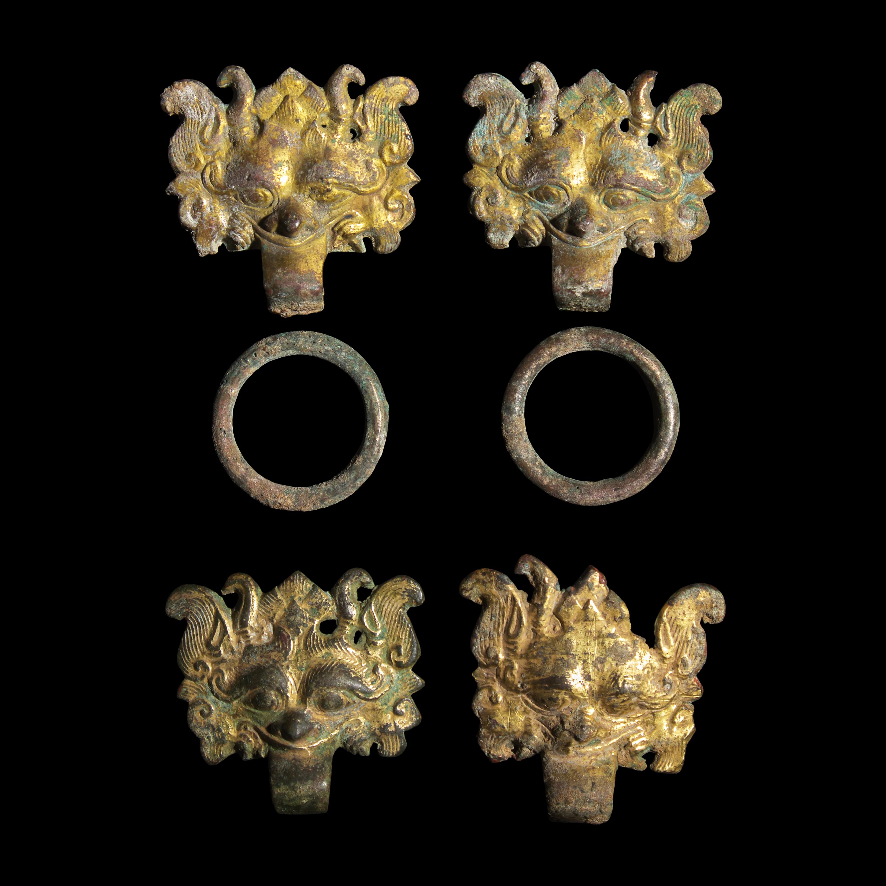 Two Pairs of Chinese Gilt Bronze 'Taotie Mask' Fittings, Han-Six Dynasties — 漢-六朝 銅鎏金饕餮紋輔首兩對