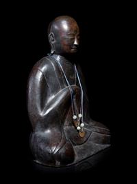 A Chinese Bronze Figure of a Monk