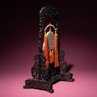 A Chinese White Jade Chime-Form Pendant, 18th/19th Century — 清中期 白玉罄
