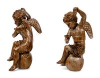 A Pair of Continental Carved Oak Cherubs