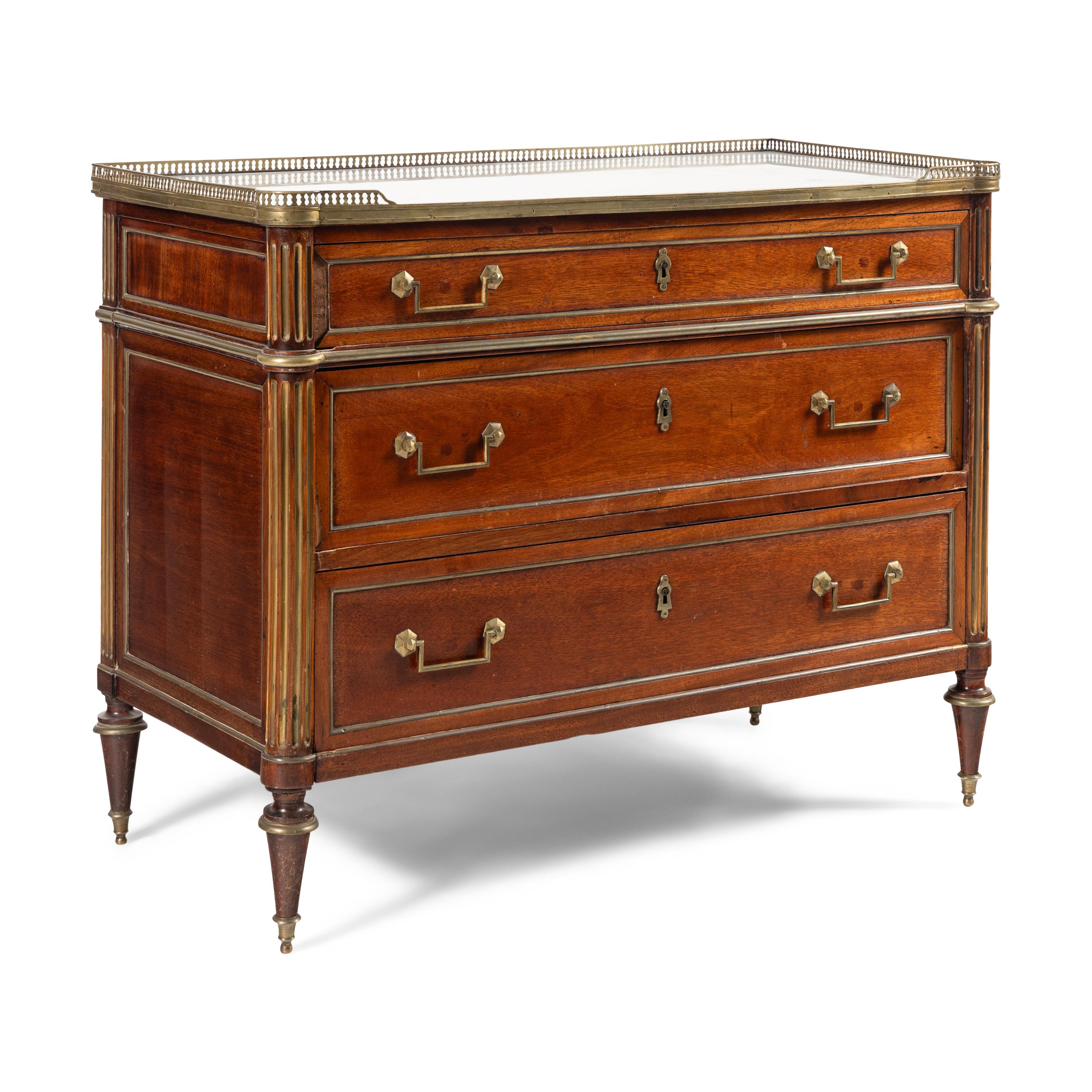 A Directoire Gilt Brass Mounted Mahogany Marble-Top Commode