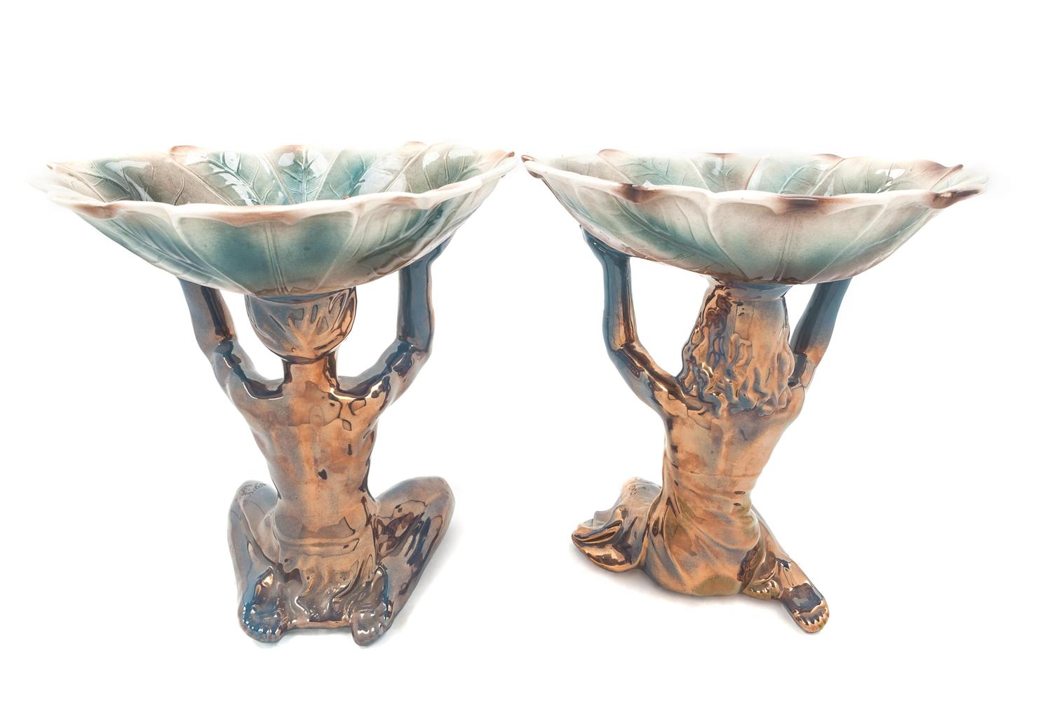 A Pair of Continental Ceramic Figural Compotes
