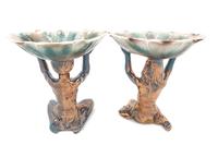 A Pair of Continental Ceramic Figural Compotes