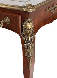 A Louis XV Style Gilt Metal Mounted Bureau Plat