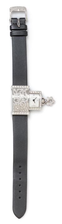 An 18 Karat White Gold, Diamond and Mother-of-Pearl Concealed 'Secret Dentelle' Wristwatch, Van Cleef & Arpels, Circa 2005,