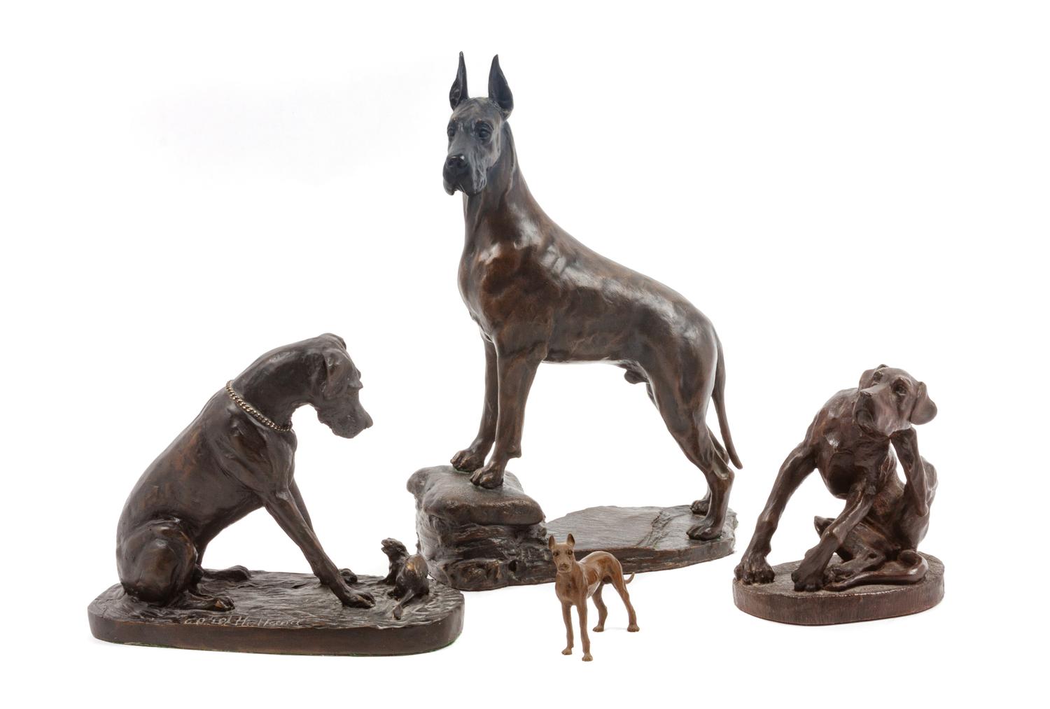 A Group of Four Great Dane Sculptures Height of tallest 10 inches.