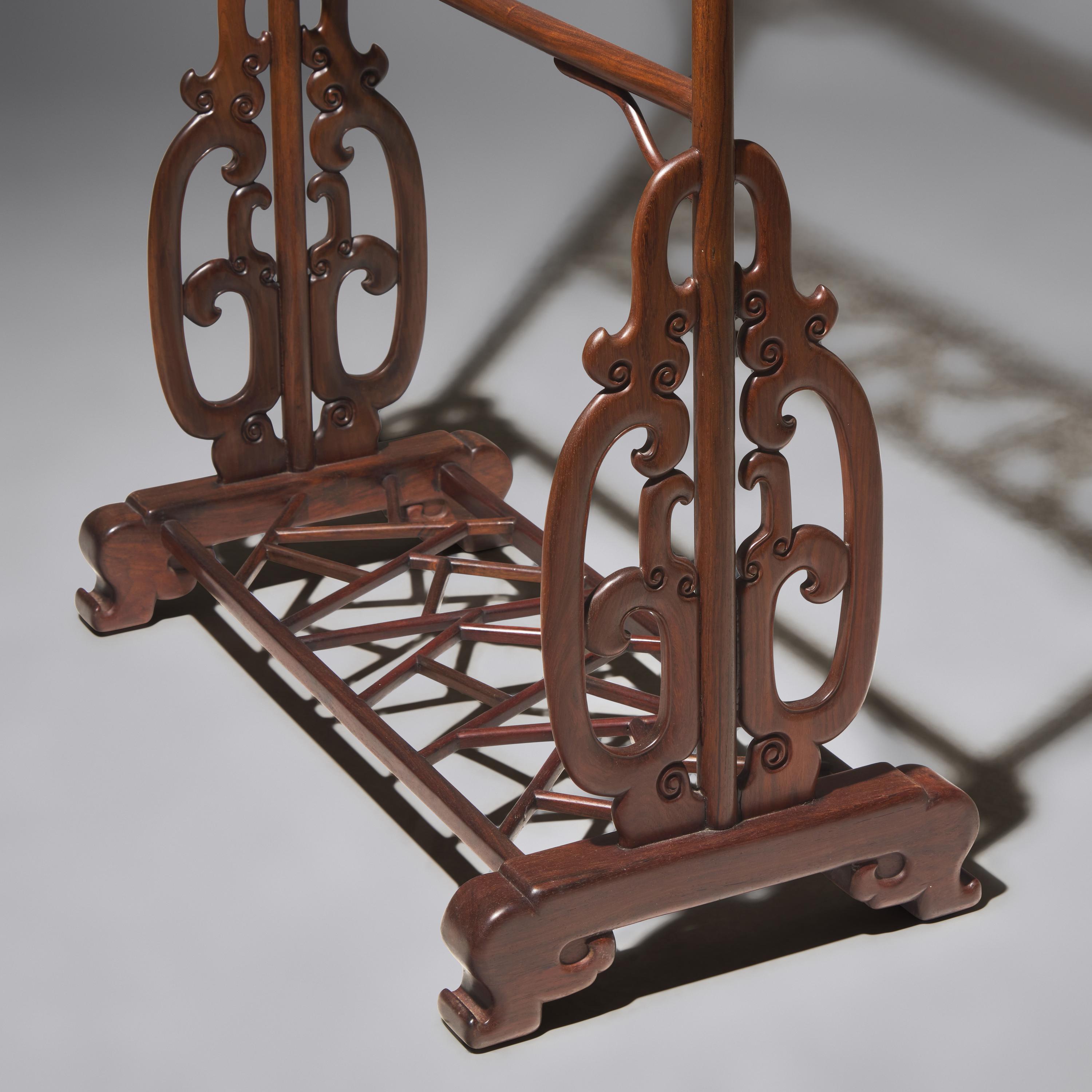 A Chinese Carved Hongmu Clothes Stand, Yijia, 20th Century 近代 紅木透雕冰梅紋衣架