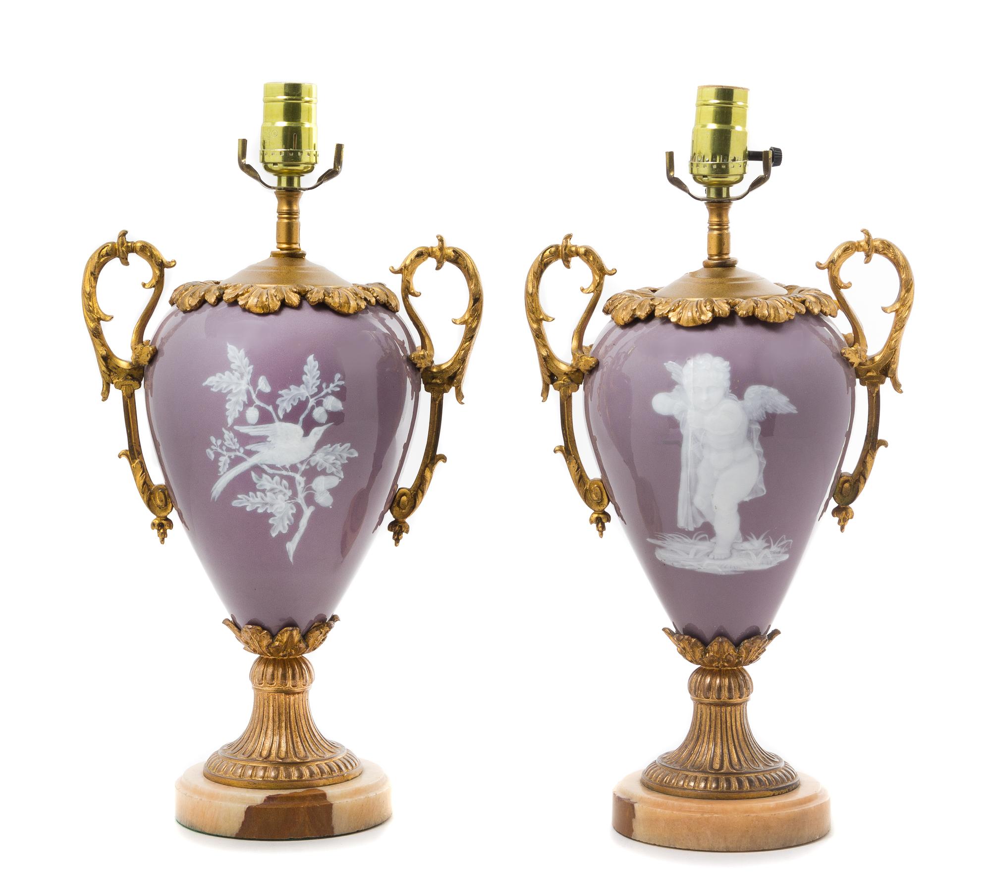 A Pair of French Gilt Bronze Mounted Pate-sur-Pate Porcelain Urns Height overall 17 1/2 inches. — LATE 19TH CENTURY