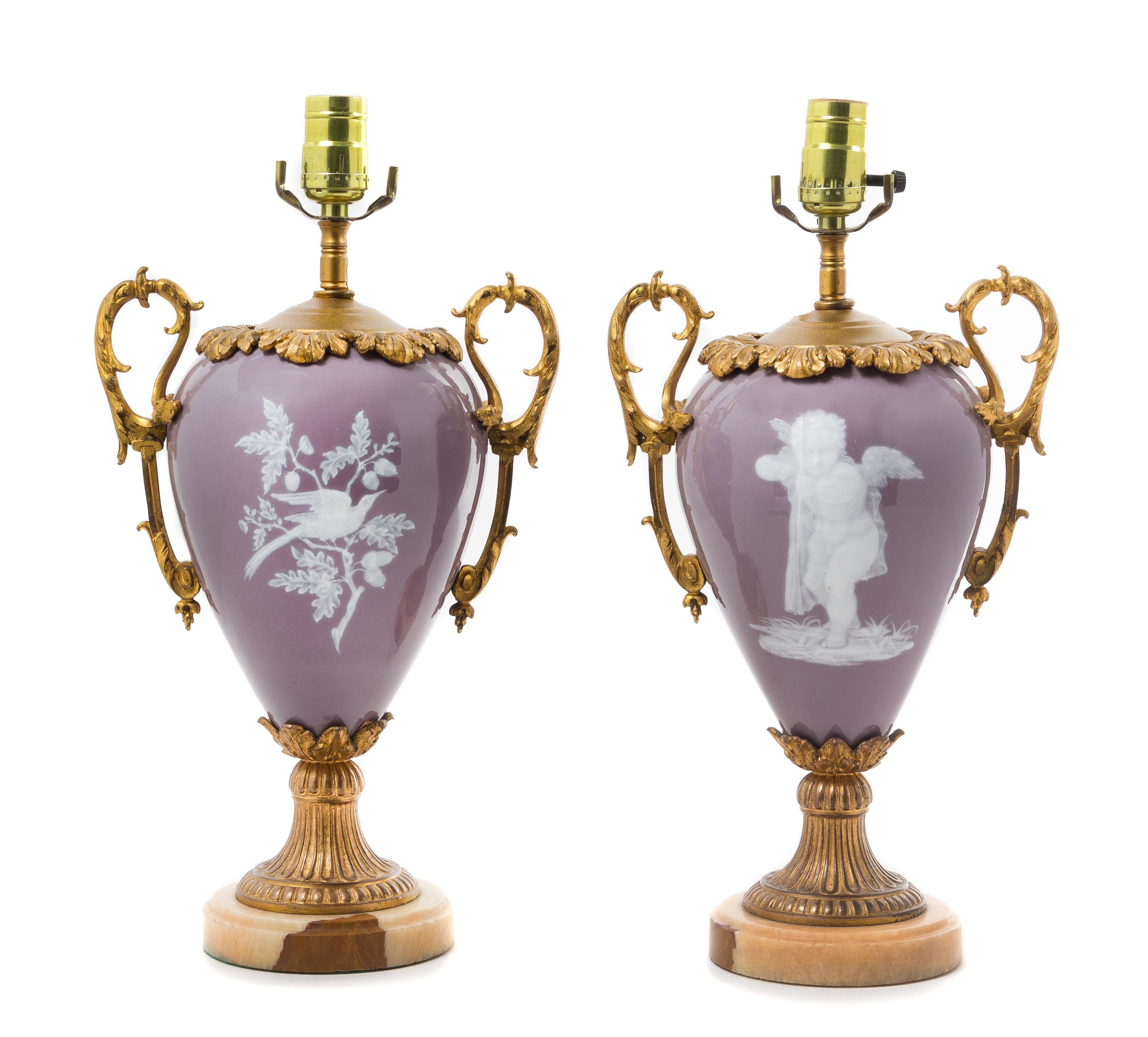 A Pair of French Gilt Bronze Mounted Pate-sur-Pate Porcelain Urns Height overall 17 1/2 inches. — LATE 19TH CENTURY