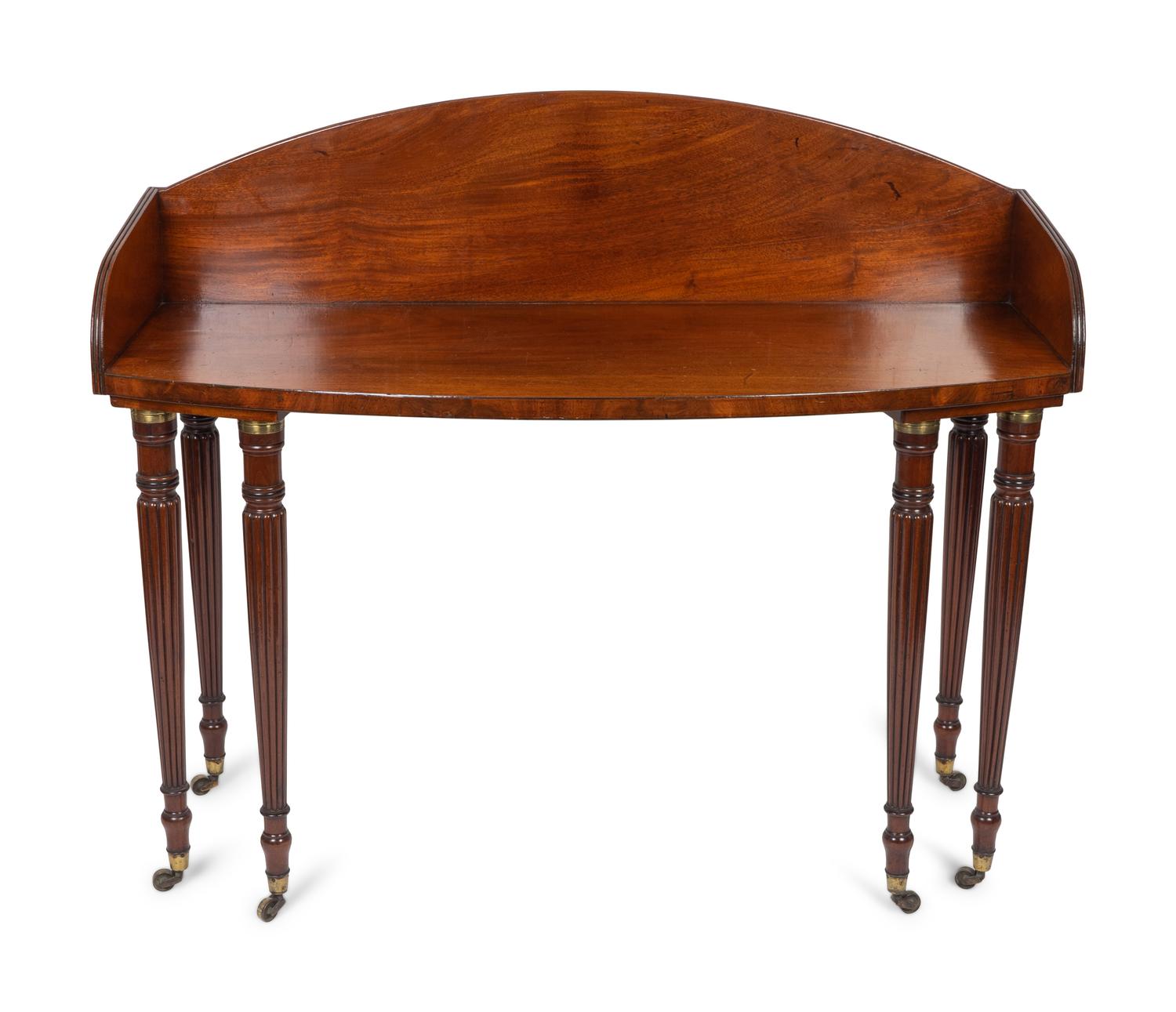 A Regency Mahogany Bow Front Dressing Table — 19TH CENTURY