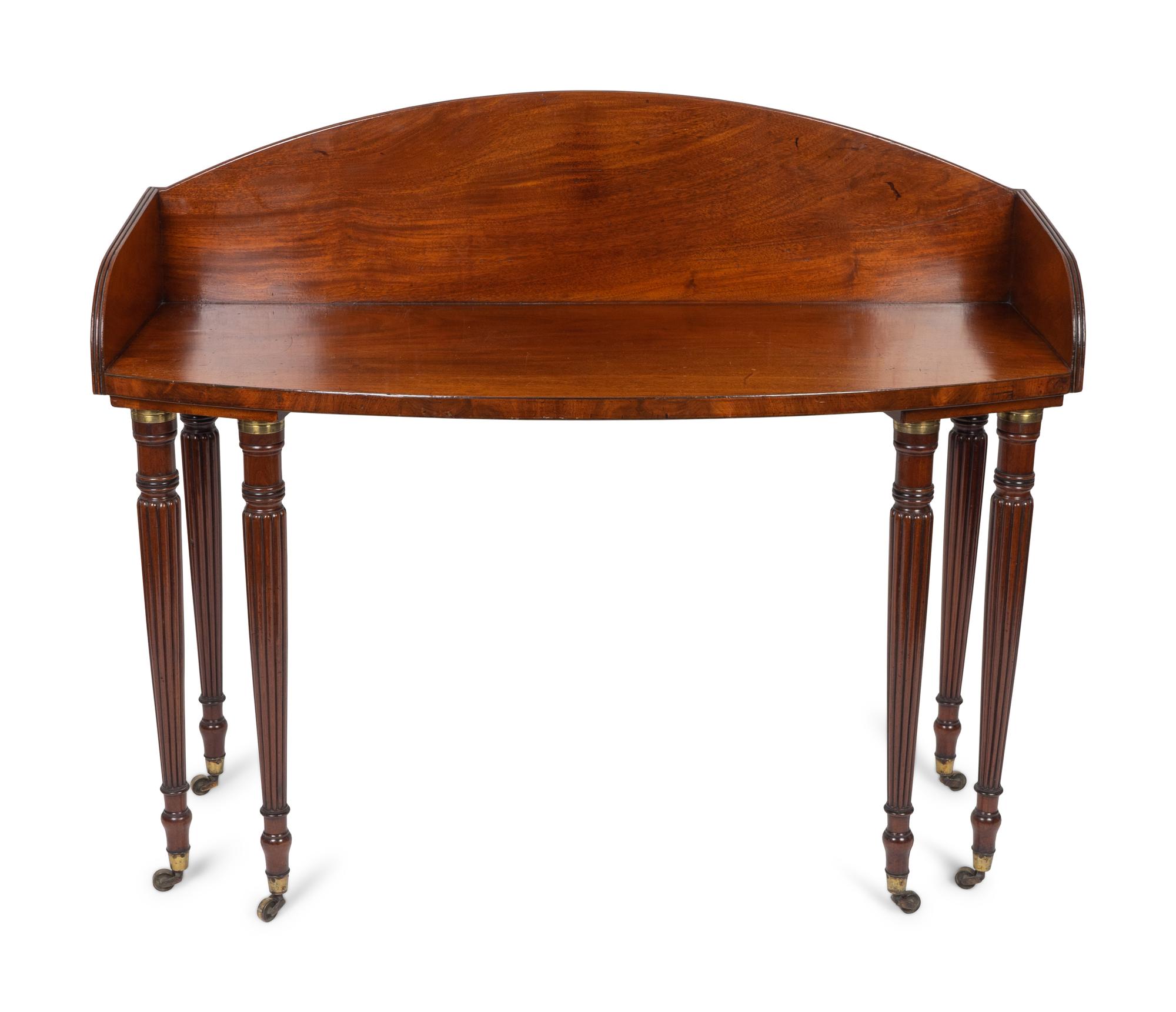 A Regency Mahogany Bow Front Dressing Table — 19TH CENTURY