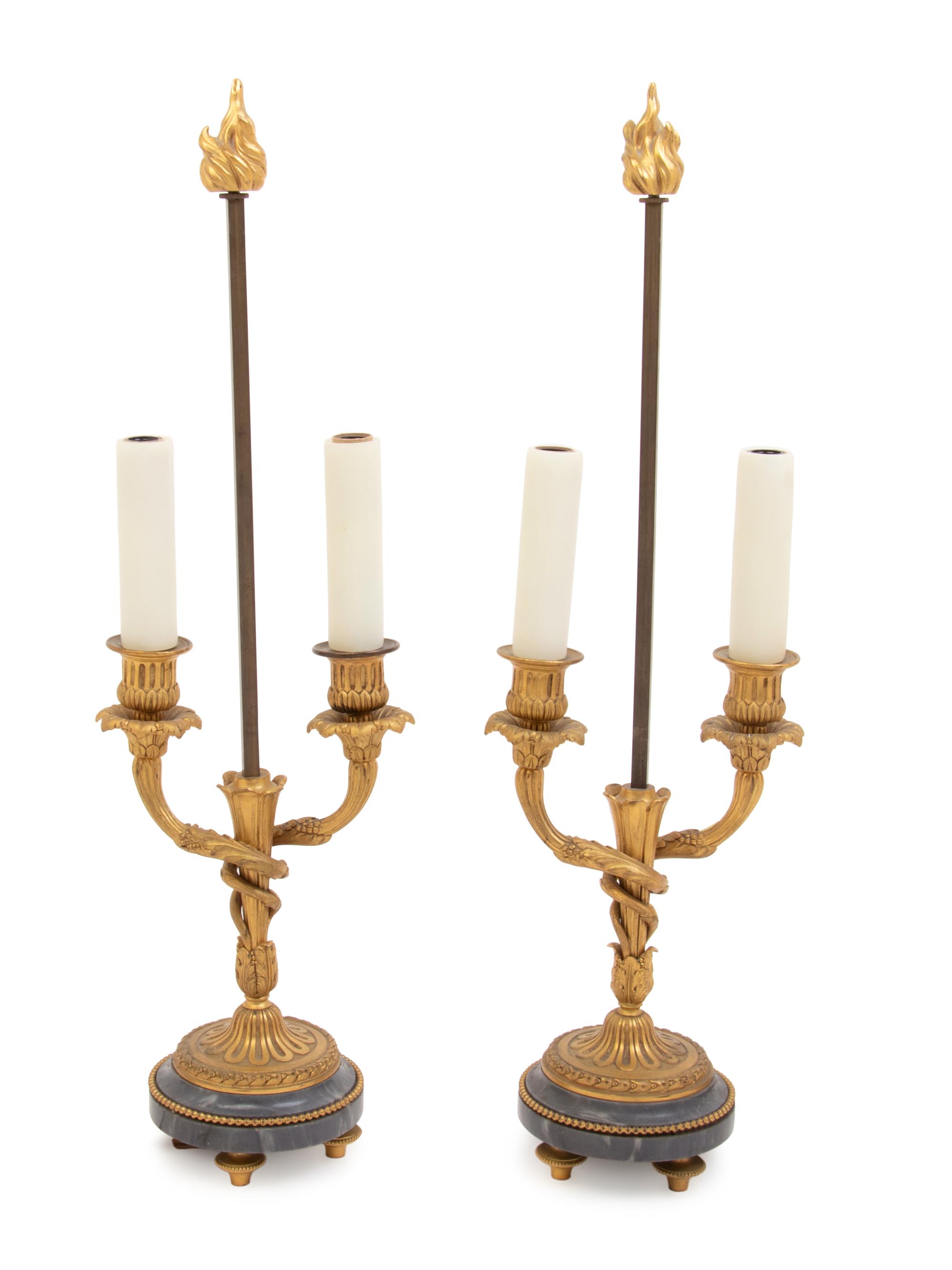 A Pair of Louis XVI Style Gilt Bronze and Marble Two-Light Lamps with Tôle Shades