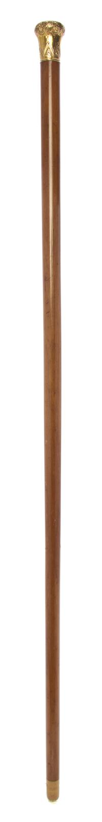An American Chased Gold Filled Handled Walking Stick, Length of handle 1 1/2 x length overall 32 3/4 inches.