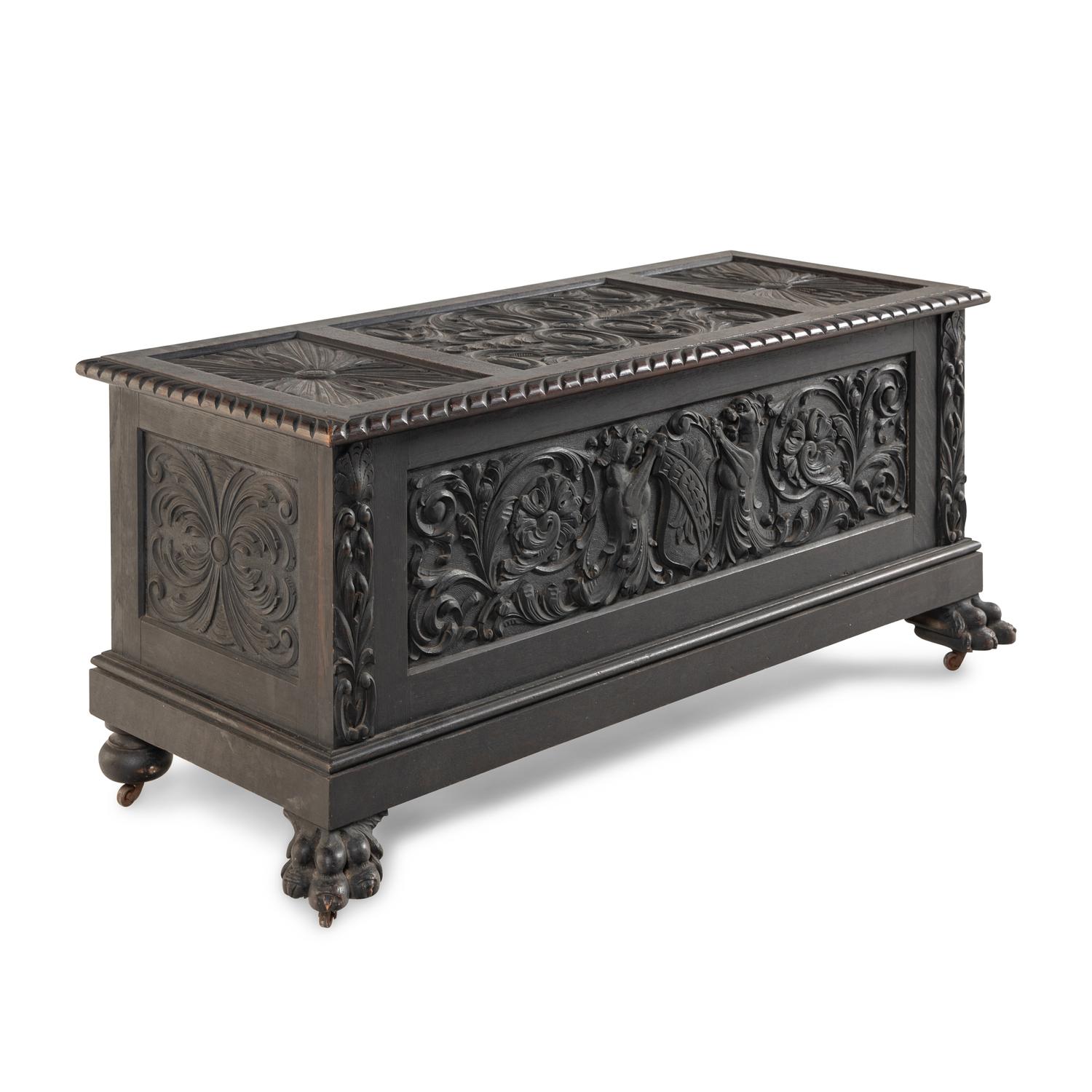 A Renaissance Revival Carved Oak Blanket Chest