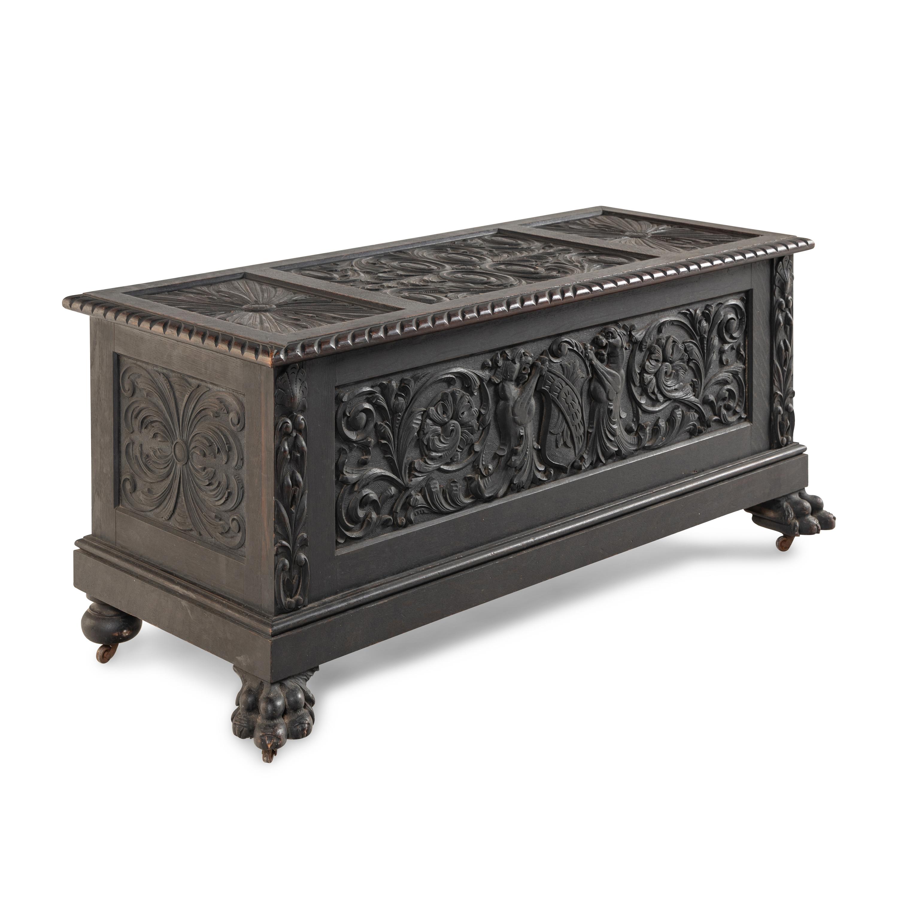 A Renaissance Revival Carved Oak Blanket Chest