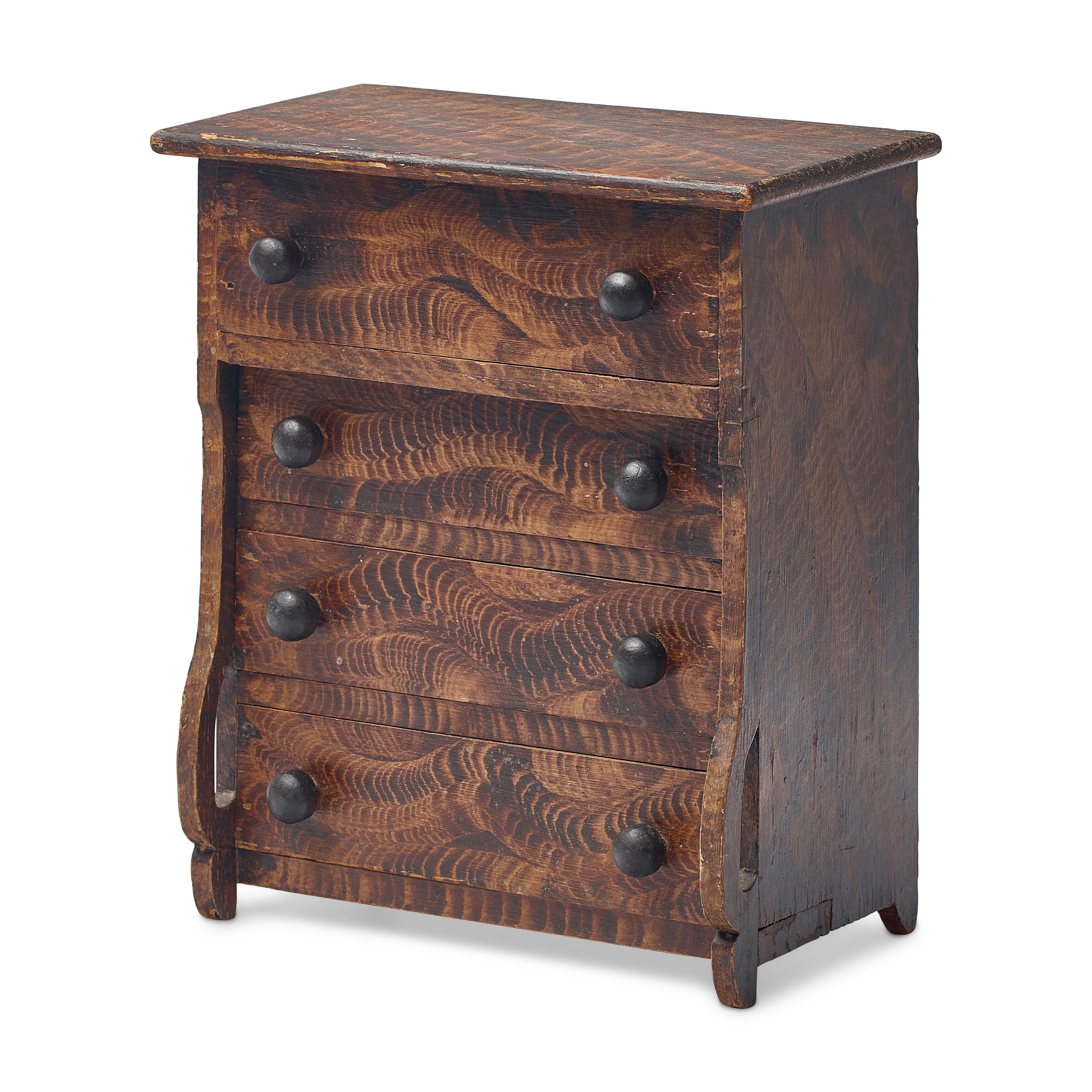 A Classical Grain Painted Pine Miniature Chest of Drawers