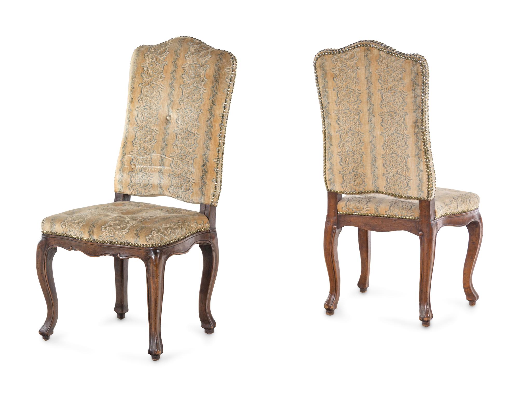 A Set of Eight Louis XV Style Dining Chairs