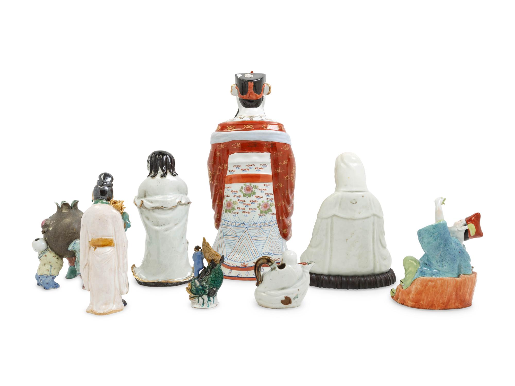 Eight Chinese Famille Rose Porcelain Figures