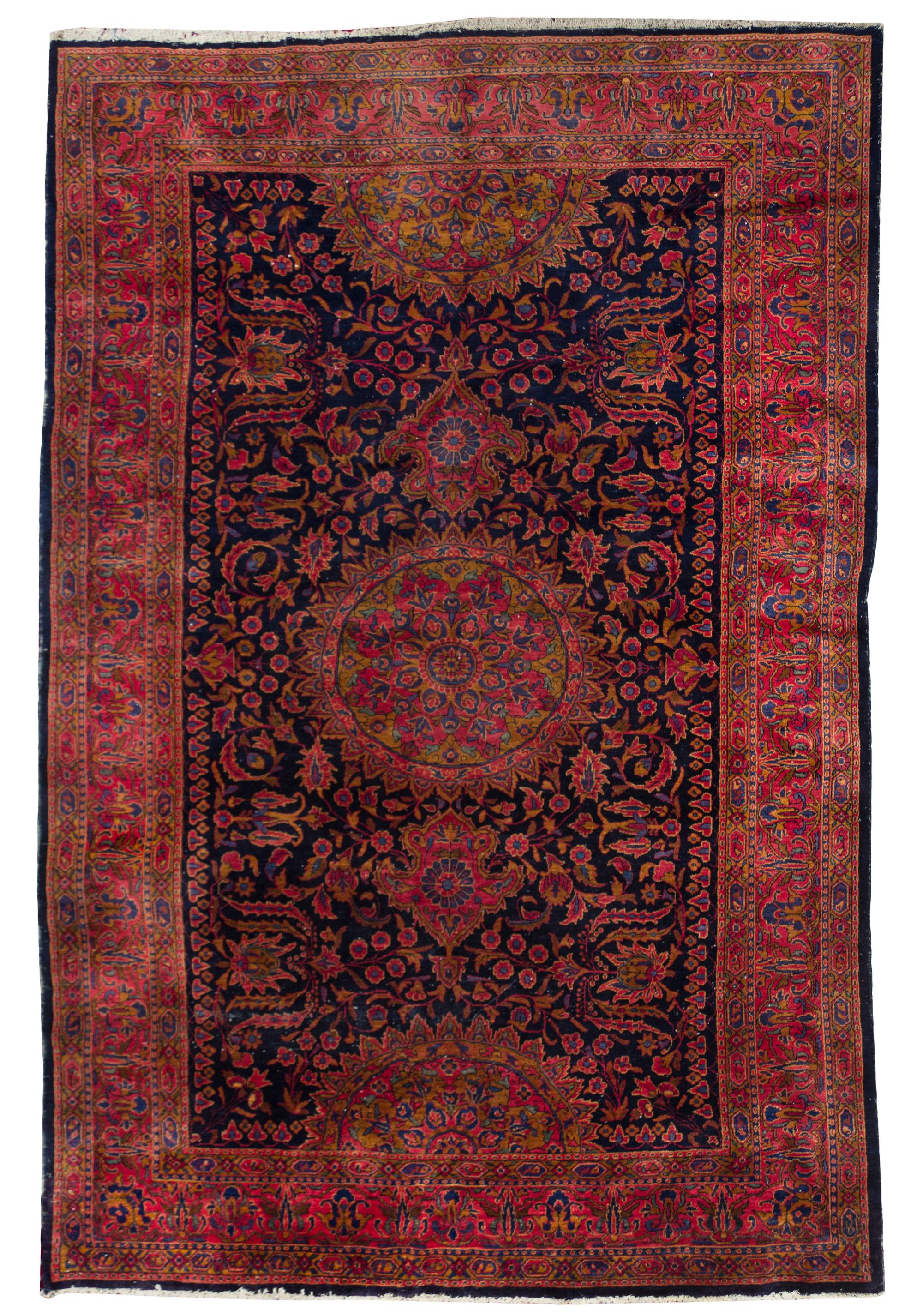 A Sarouk Wool Rug, 7 feet x 10 feet 1 inch.