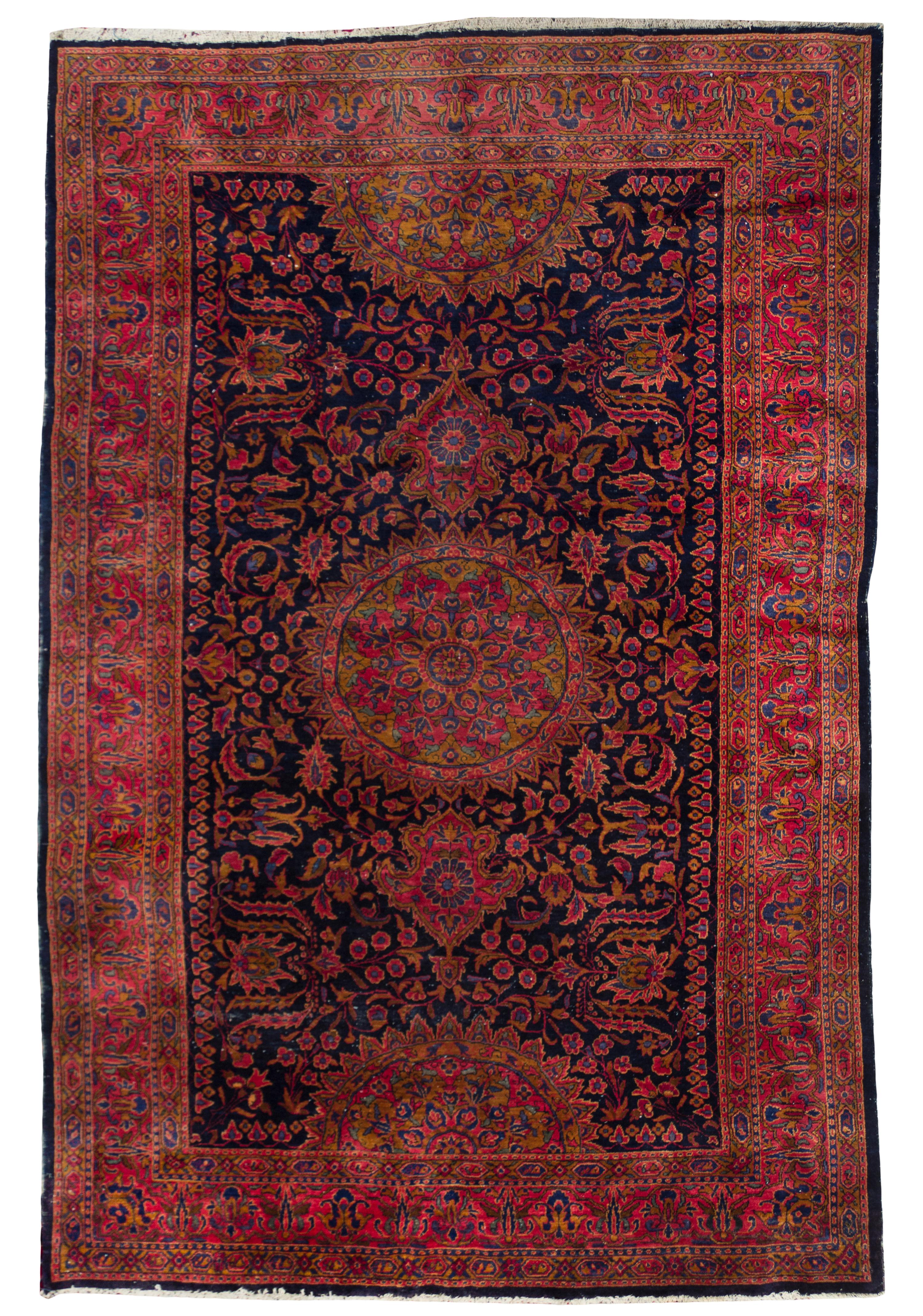A Sarouk Wool Rug, 7 feet x 10 feet 1 inch.