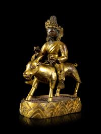 A Sino-Tibetan Gilt Bronze Figure of Garwa Nagpo