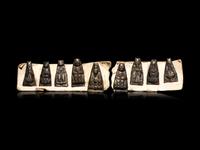 Nine Small Southeast Asian Silver Buddhist Votives