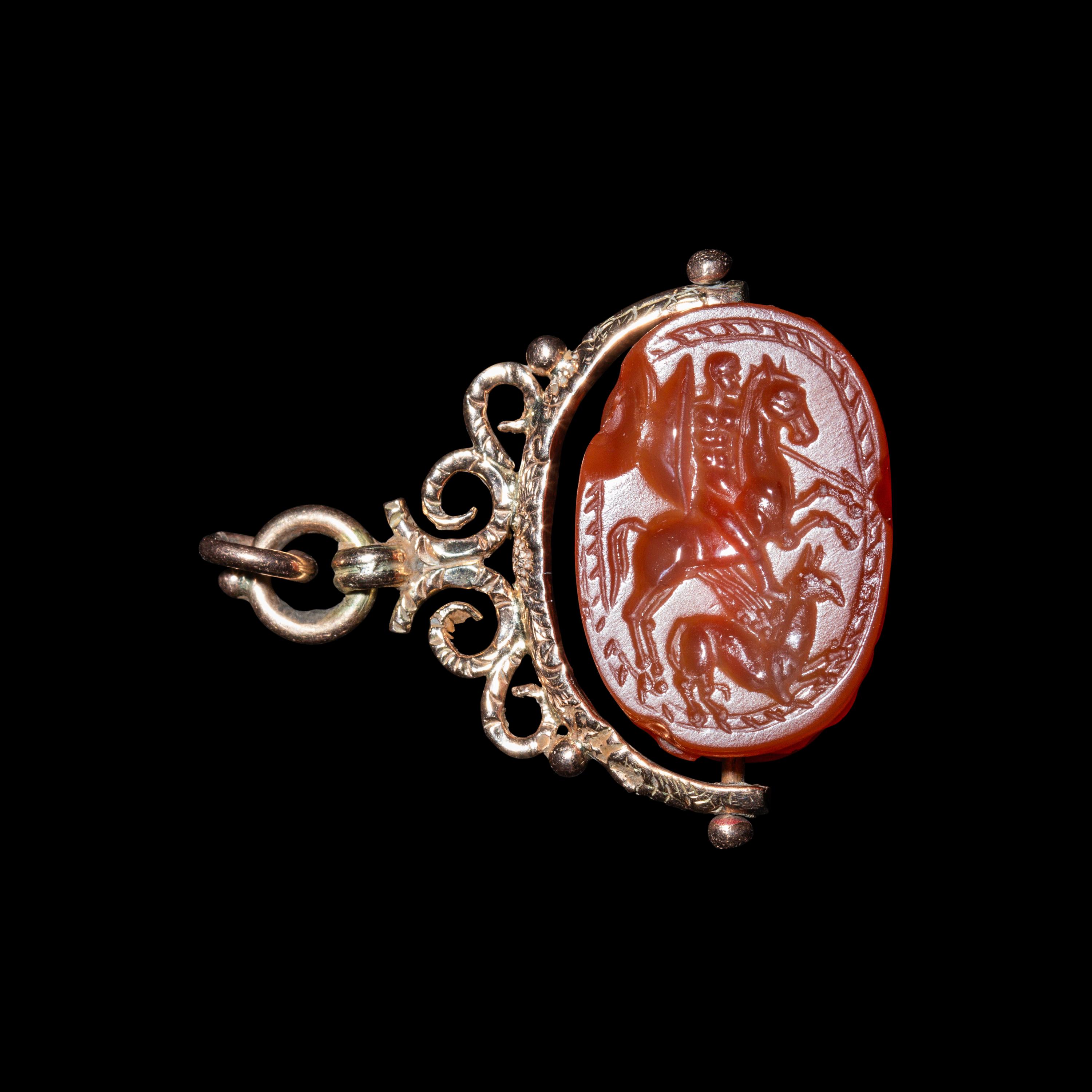 An Etruscan Carnelian Scarab with Warrior on Horseback and a Griffin — Set in a 19th Century gold swivel fob