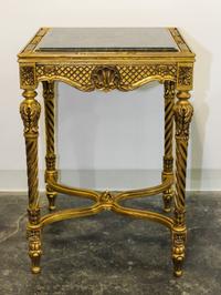 Two Louis XVI Style Giltwood Tables Height of first 29 x diameter of top 21 inches. — 20TH CENTURY