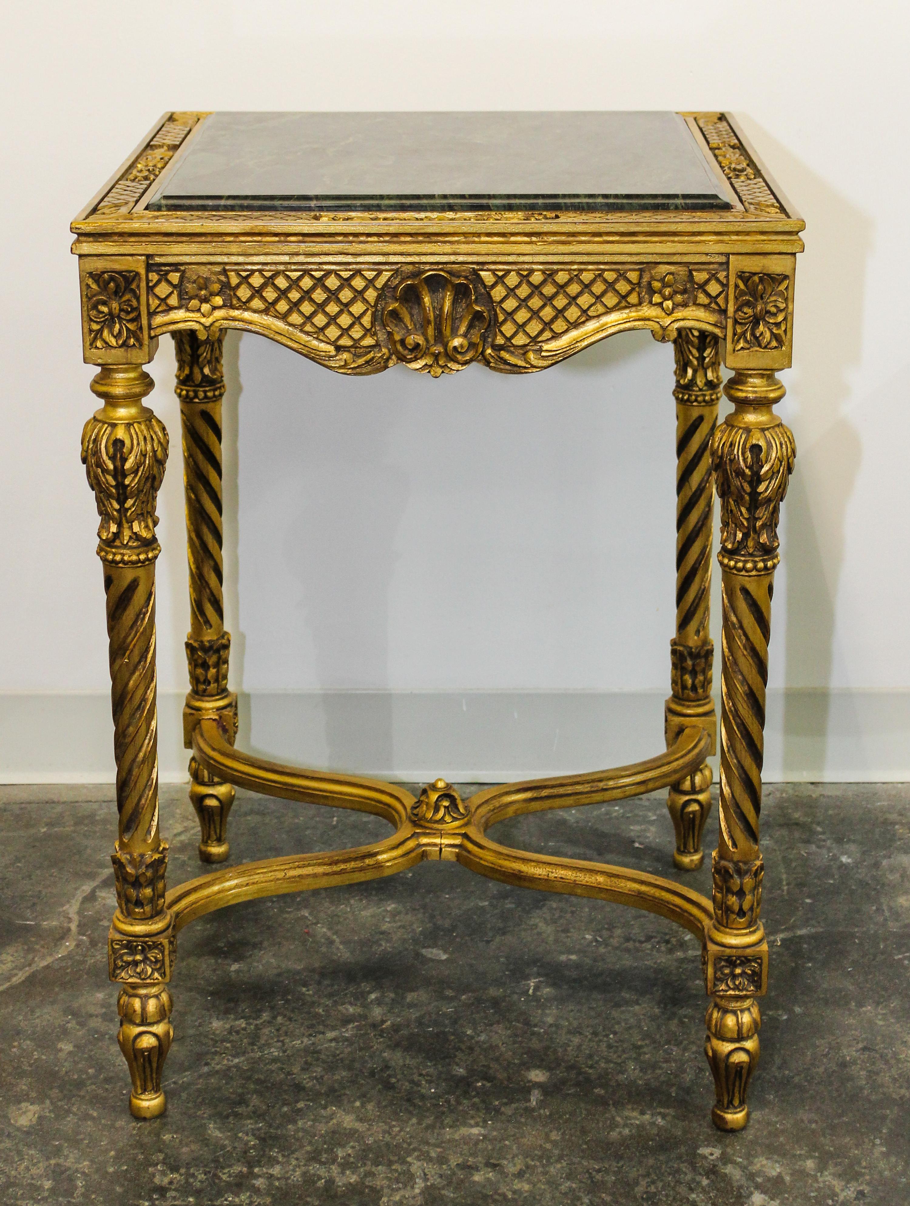 Two Louis XVI Style Giltwood Tables Height of first 29 x diameter of top 21 inches. — 20TH CENTURY