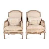 A Pair of Louis XVI Carved and Painted Bergères